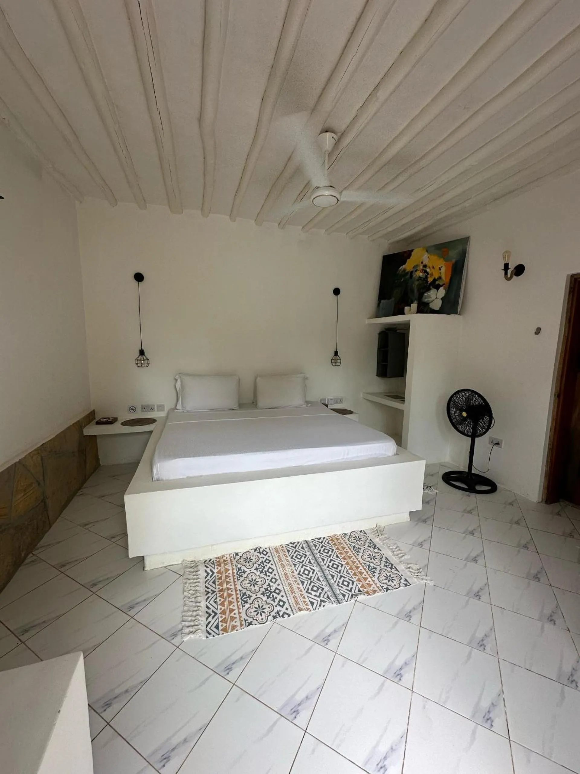 Property building, Bed in Cactus lodge Zanzibar