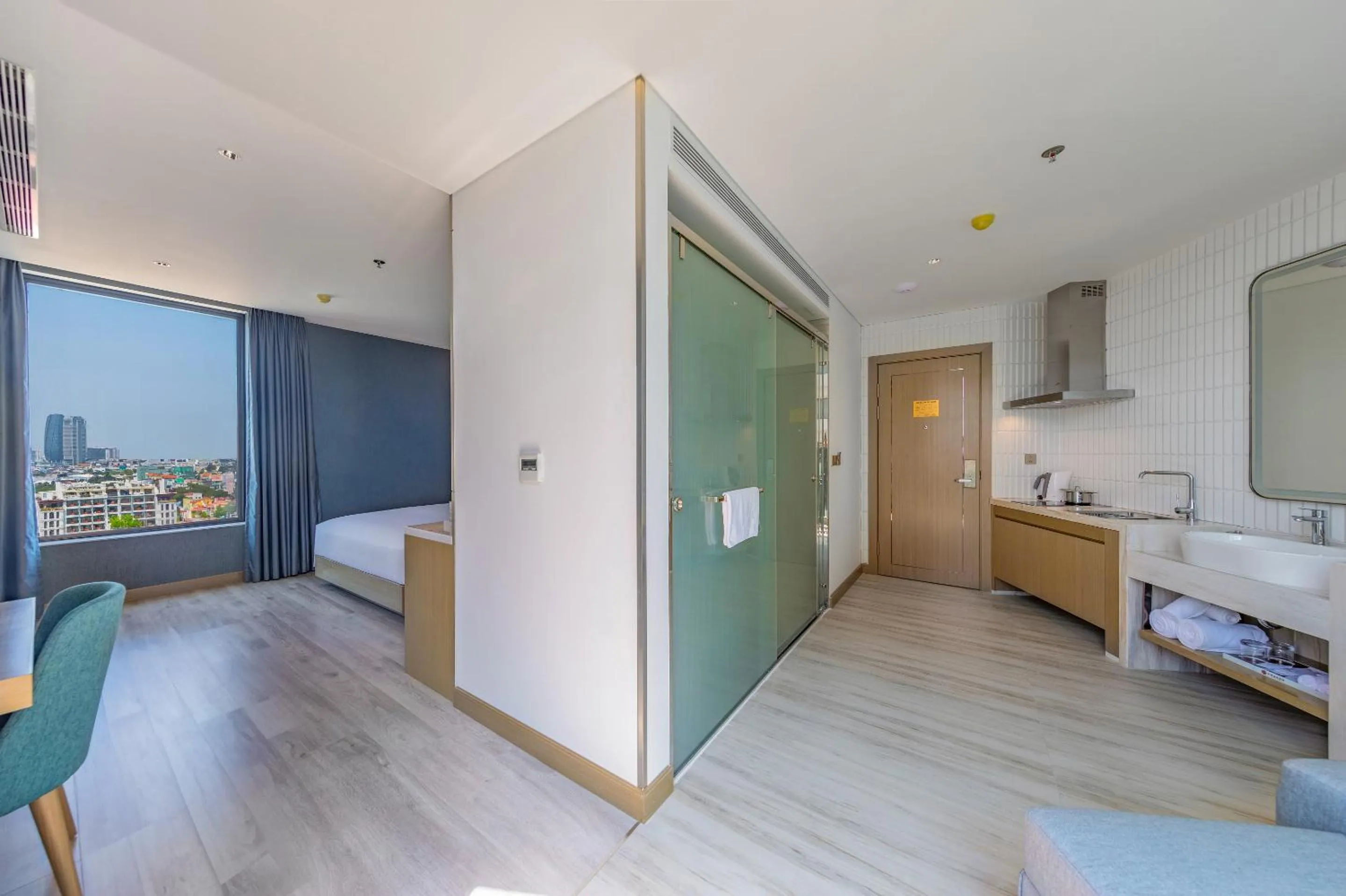 Shower, Bed in Awaken Da Nang Hotel