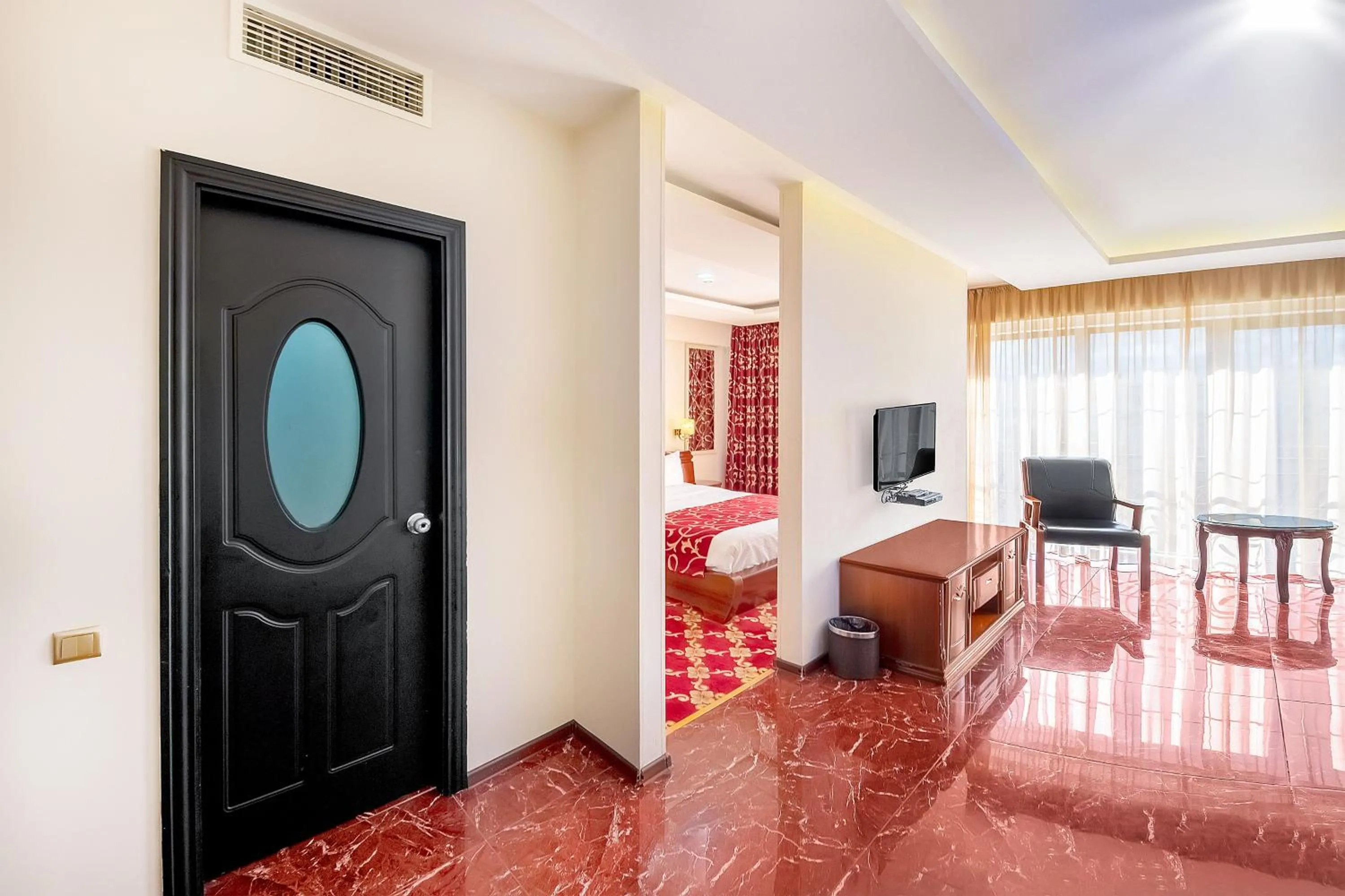 Communal lounge/ TV room in Cron Palace kosher Tbilisi Hotel