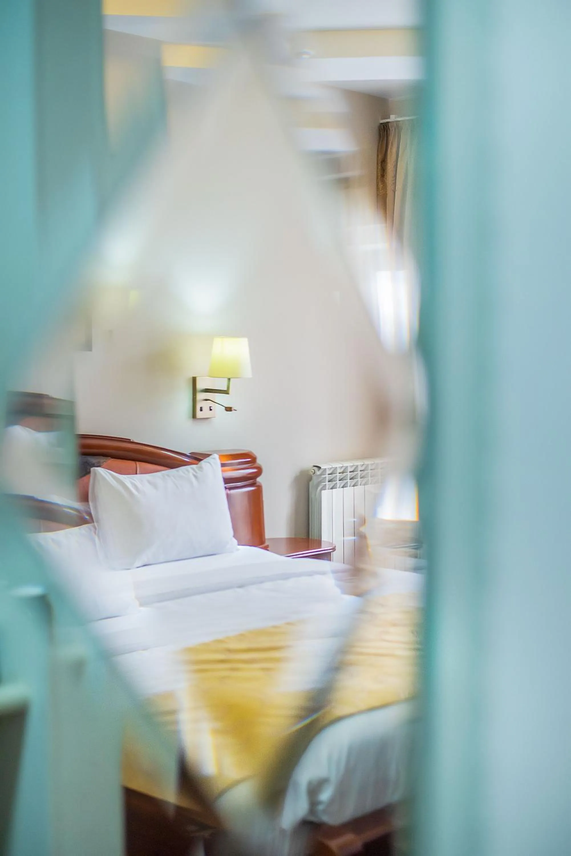 Bed in Cron Palace kosher Tbilisi Hotel