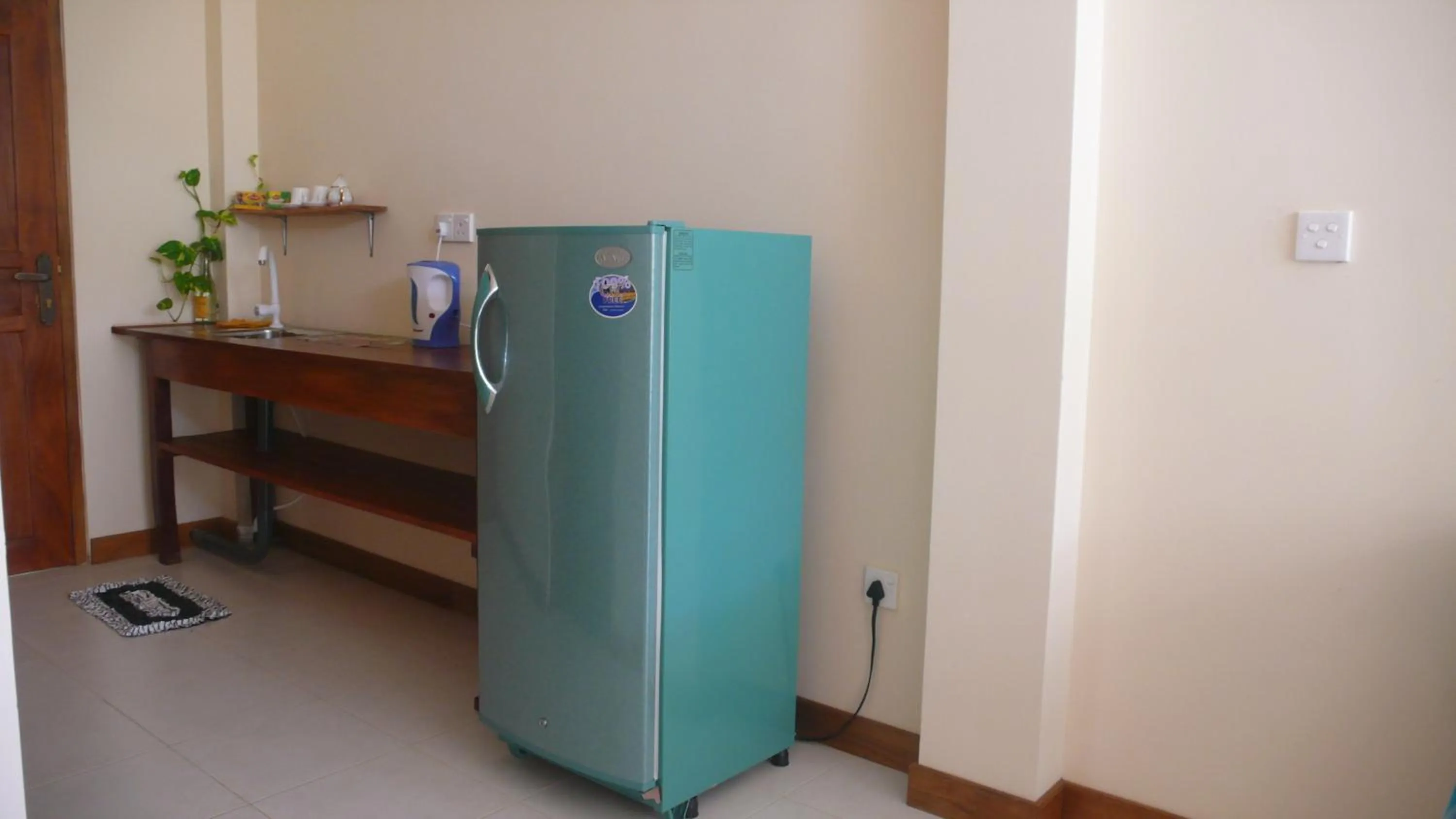 Kitchen or kitchenette in Hotel Finlanka