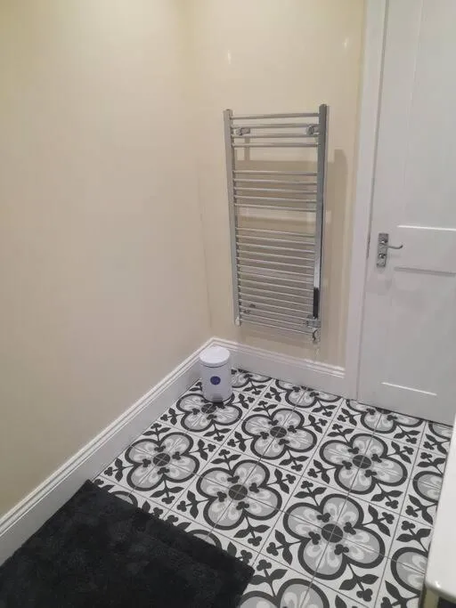Bathroom, Bed in Kirkcudbright Holiday Apartments - Apartment F