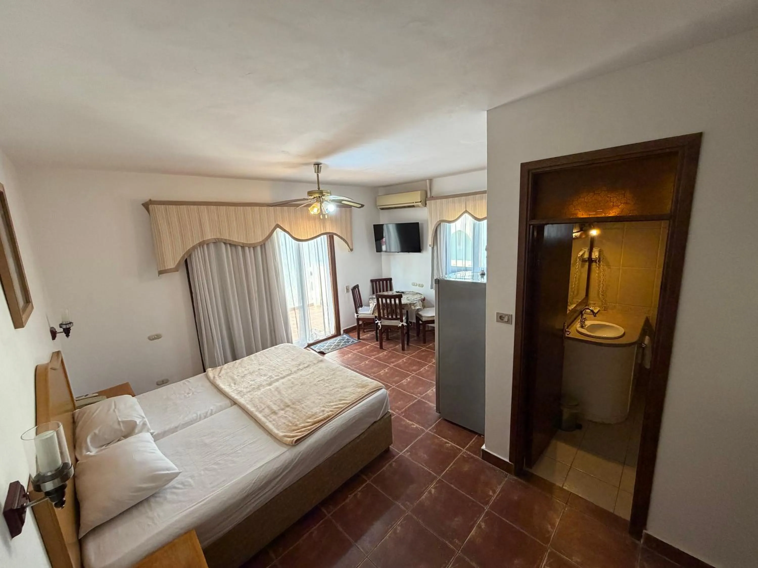 Bed in Elisir SPA & Hotel at Sheikh coast