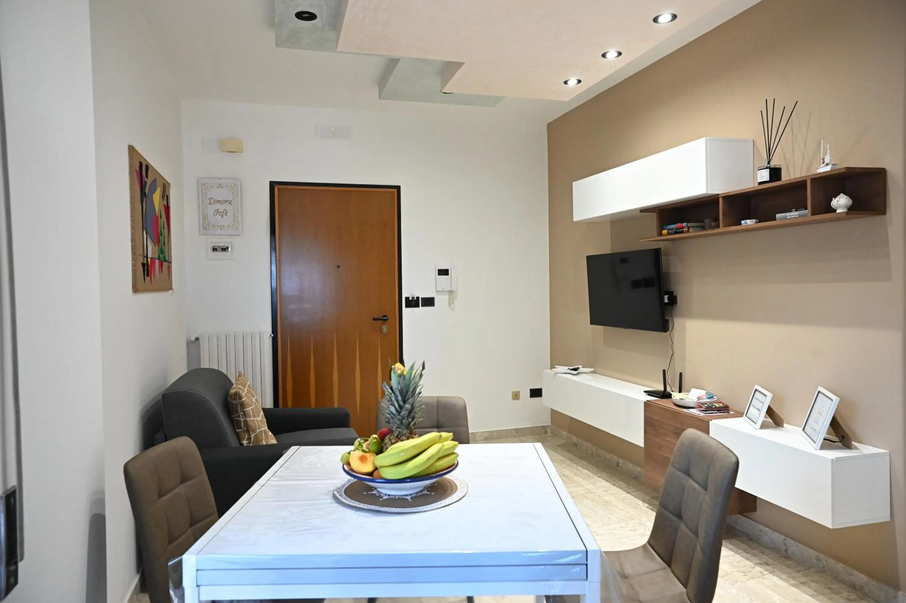 Communal lounge/ TV room in Dimora Fefè