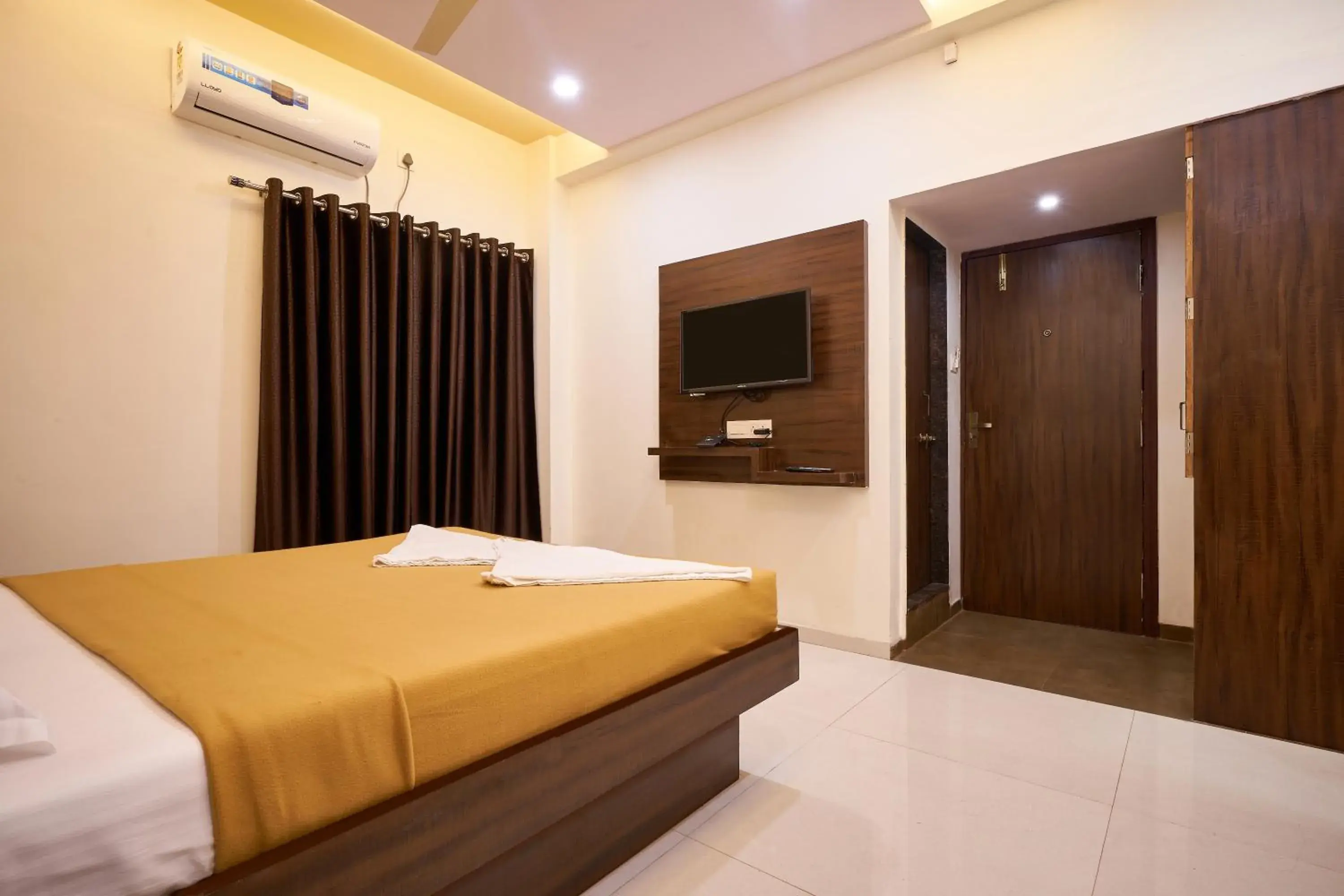 Photo of the whole room in Hotel Ranjan Deluxe Photo of the whole room in Hotel Ranjan Deluxe