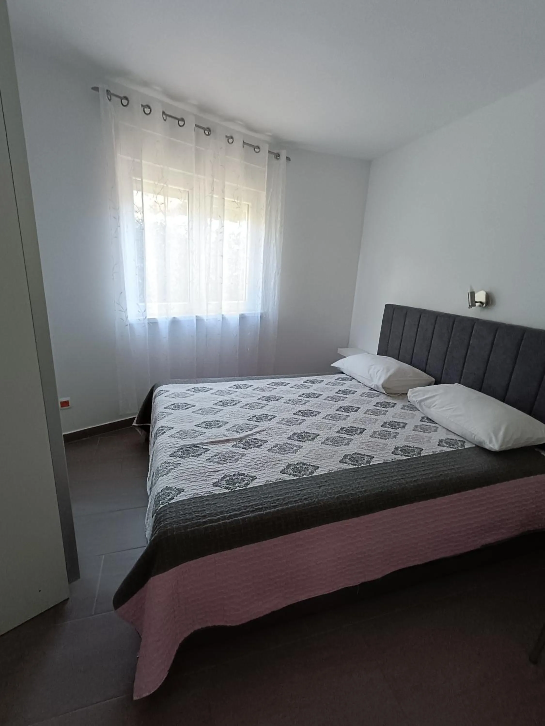 Bed in Apartment Kricin