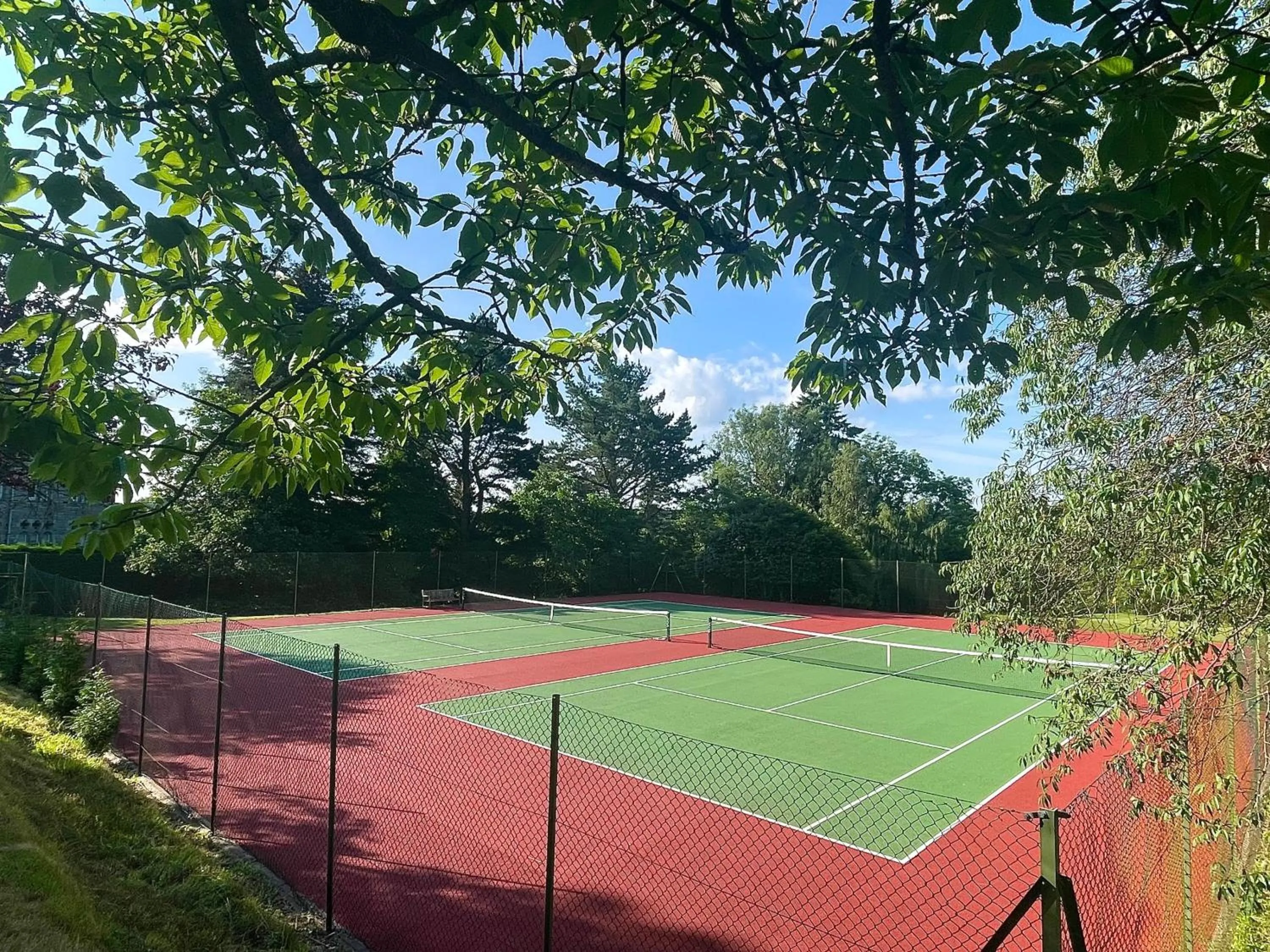 Tennis court in Ashdown Park Hotel