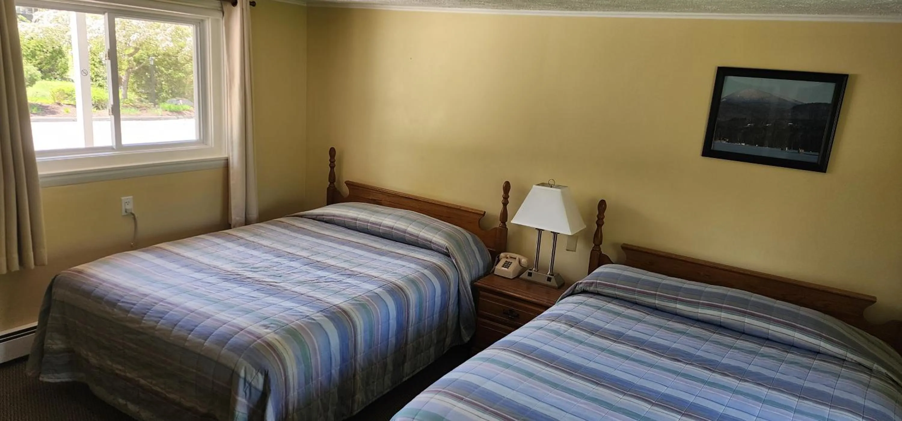 Bed in Wilson Lake Inn