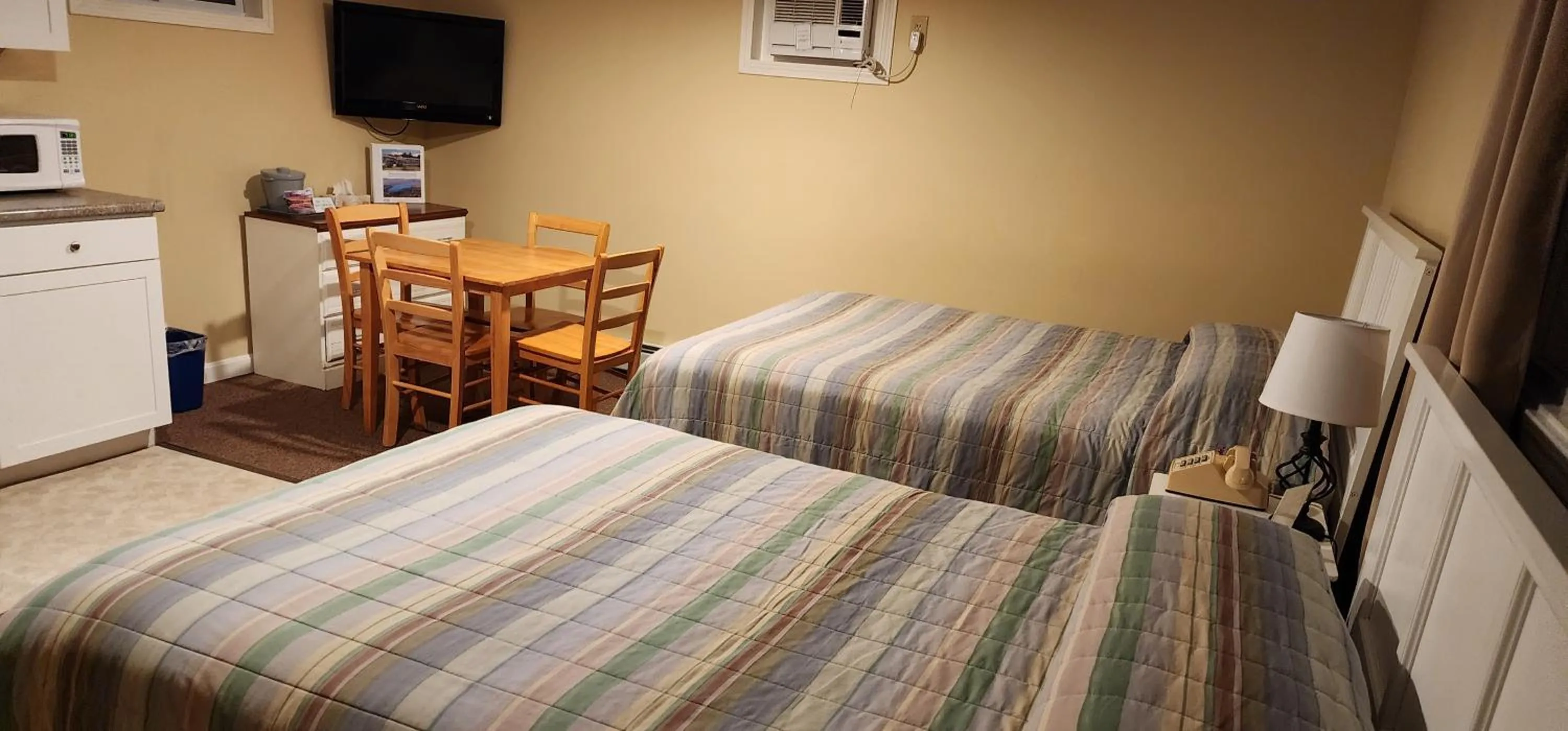 Bed in Wilson Lake Inn