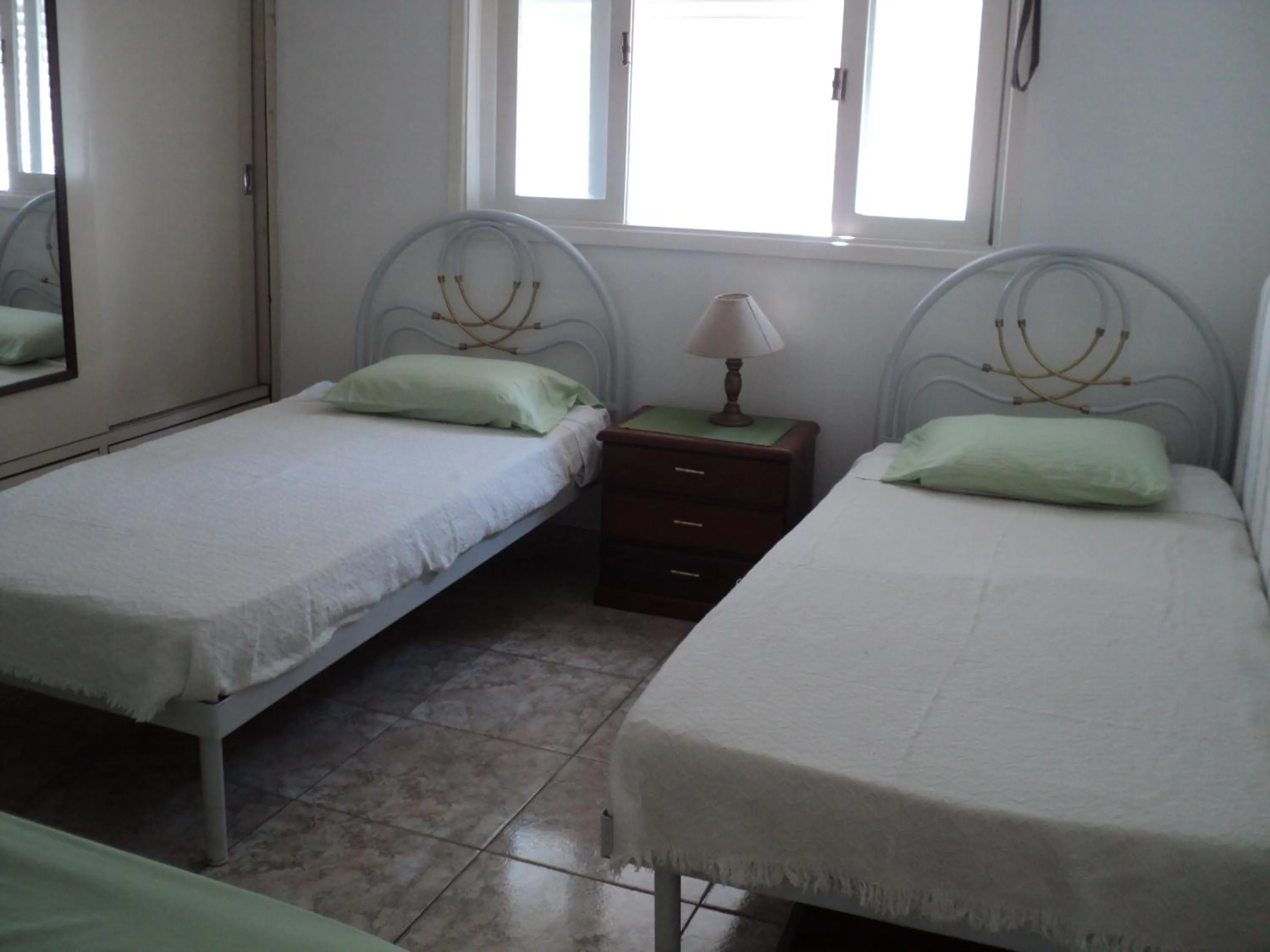 Bedroom, Bed in Apartamento Aconchegante