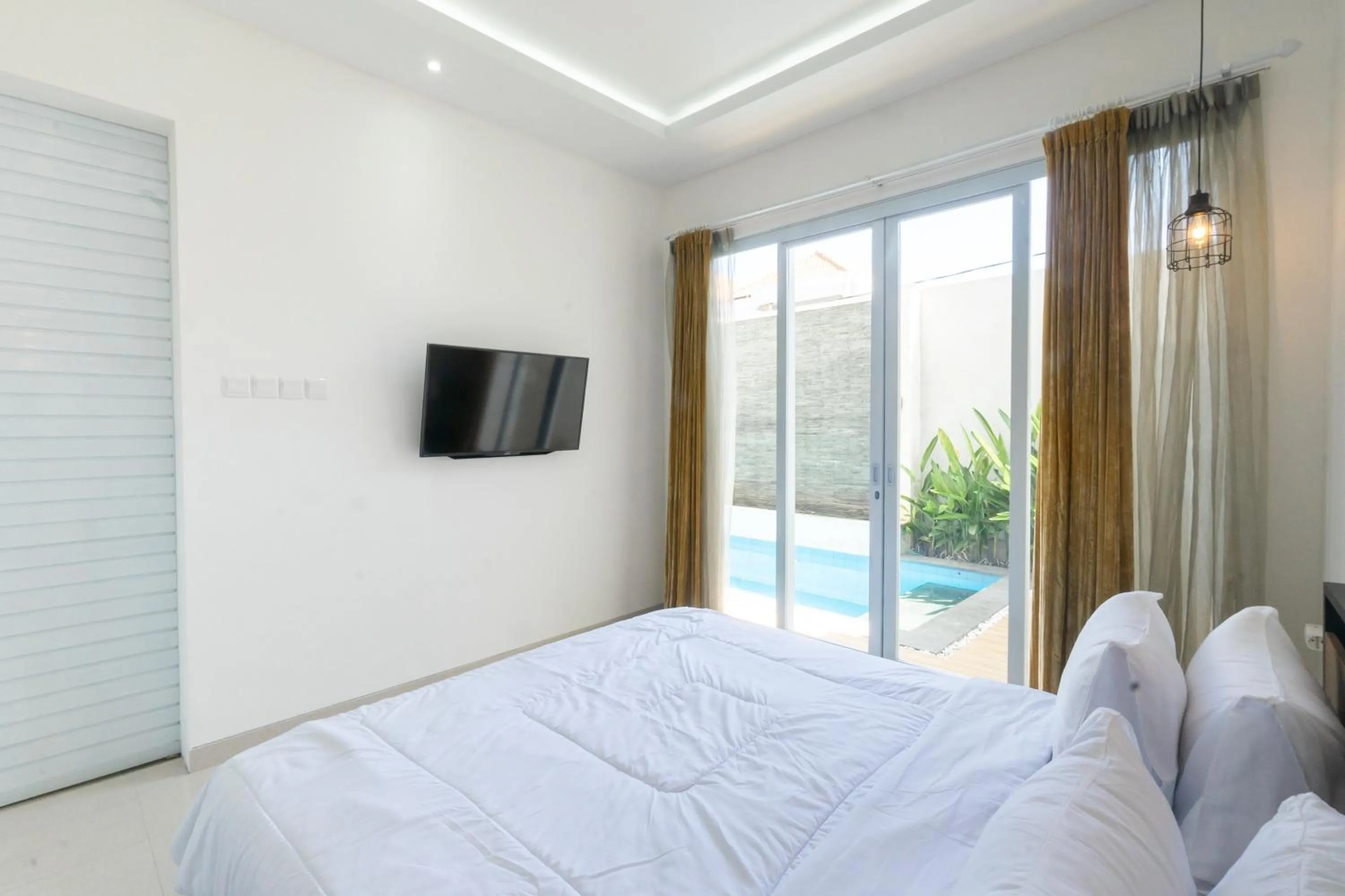 Bed in Villa Berlian Kuta