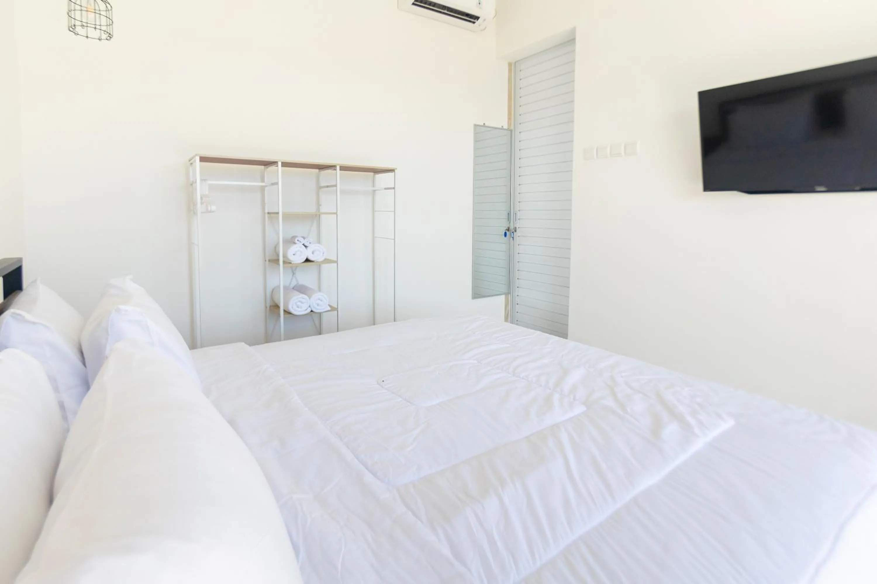 Bed in Villa Berlian Kuta