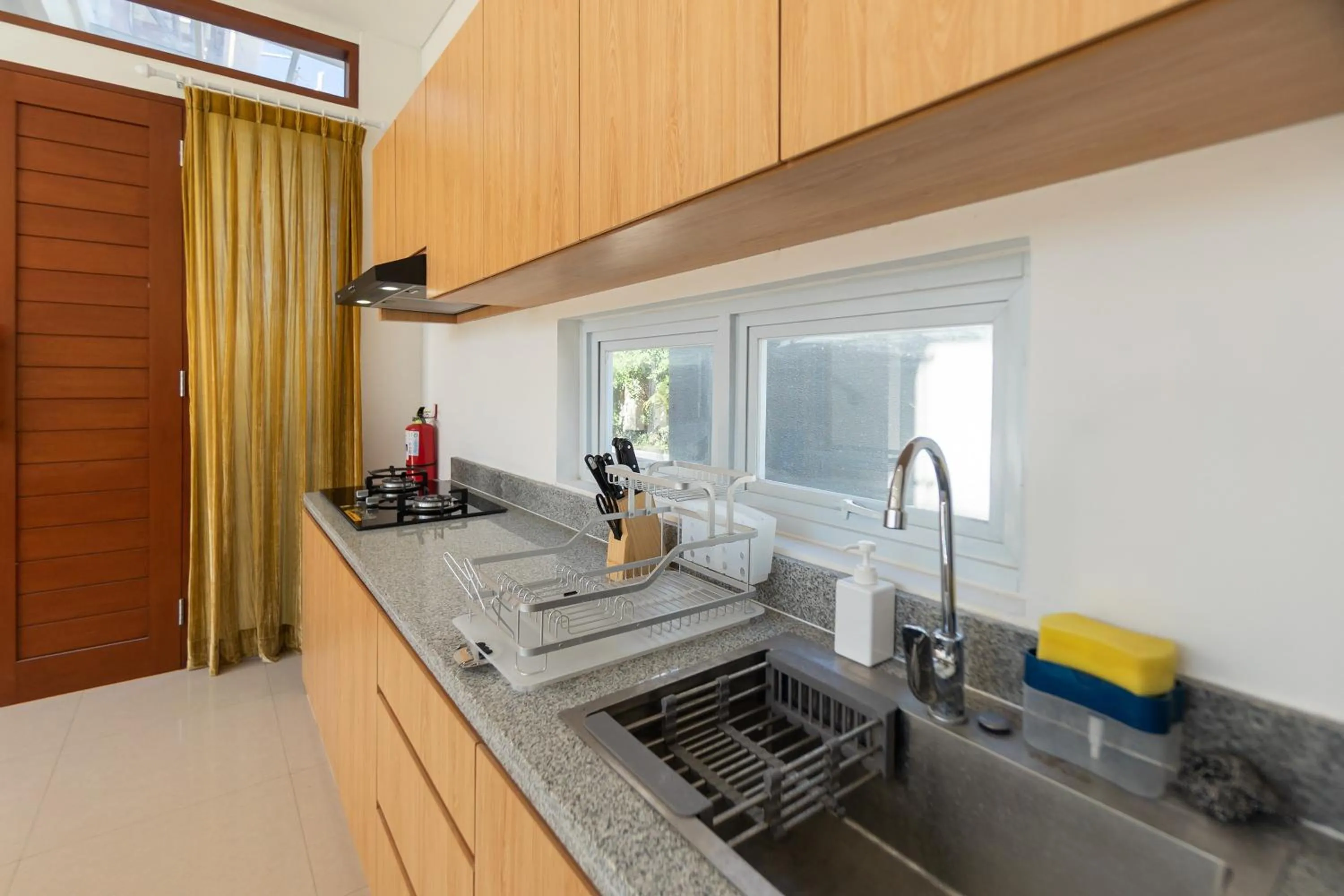 Kitchen or kitchenette in Villa Berlian Kuta