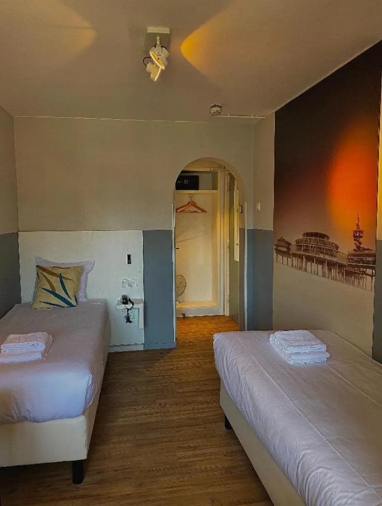 Bed in Hotel Andante aan Zee