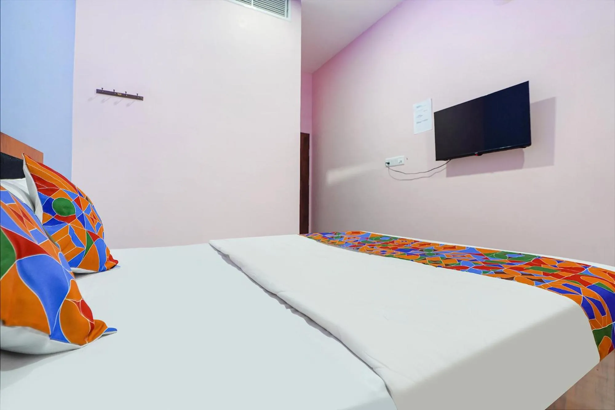 Bed in FabExpress Evaan Deluxe Rooms