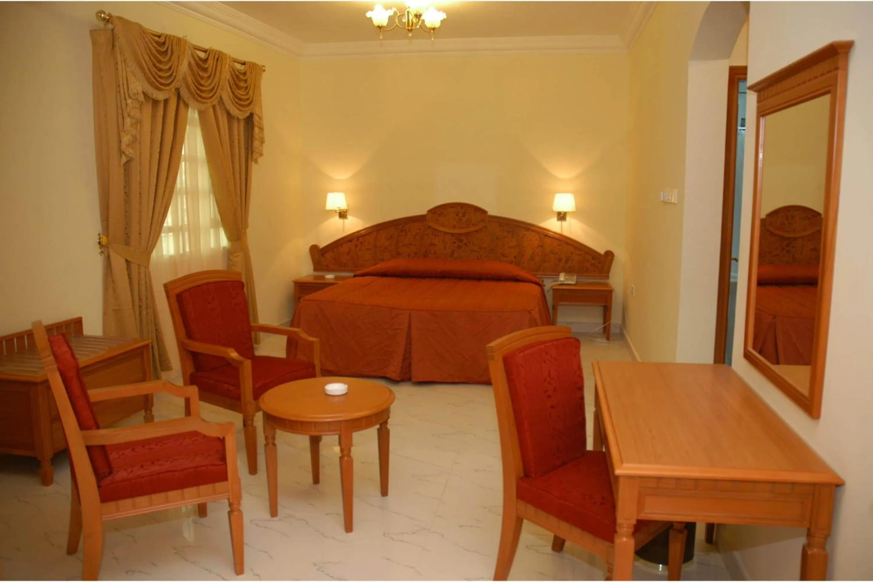 Bedroom in Super OYO 151 Manam 2 Hotel Apartment