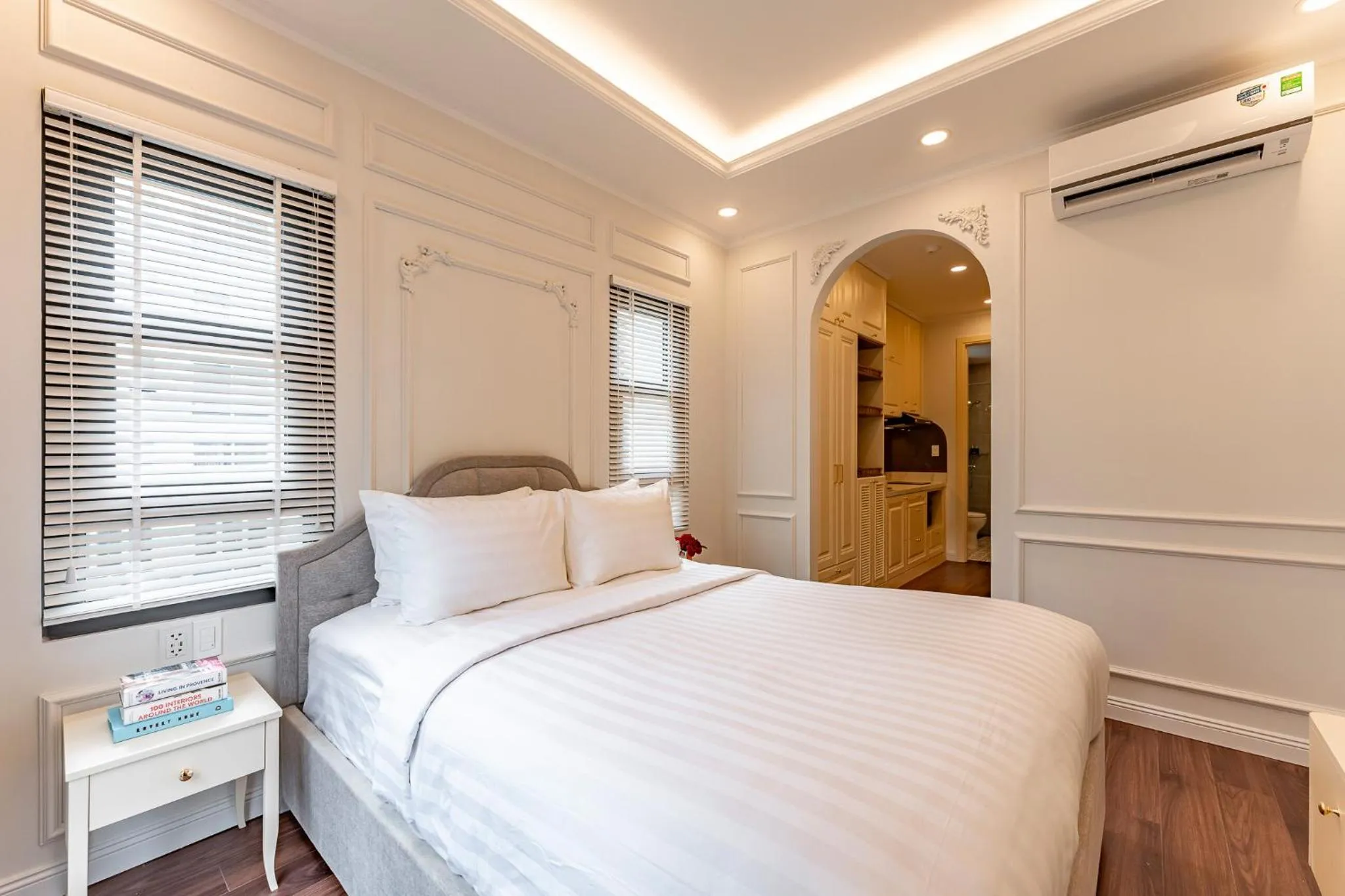 Bed in Golden Sun Apartment & Hotel