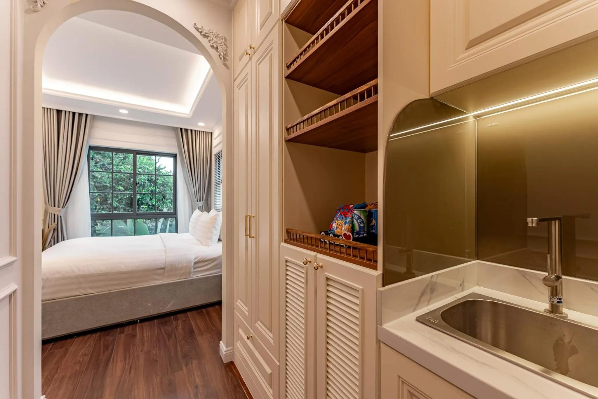 Bed in Golden Sun Apartment & Hotel