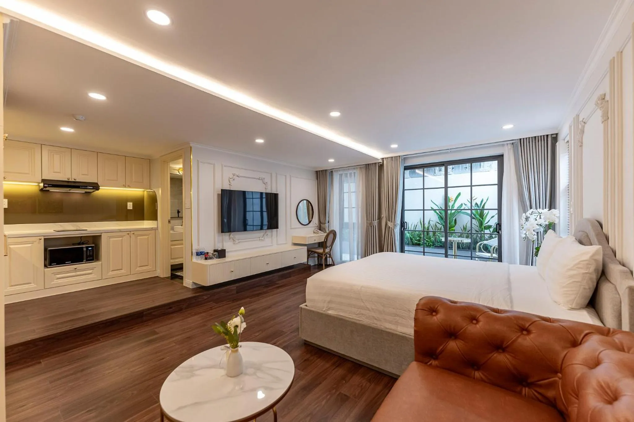 Bed in Golden Sun Apartment & Hotel