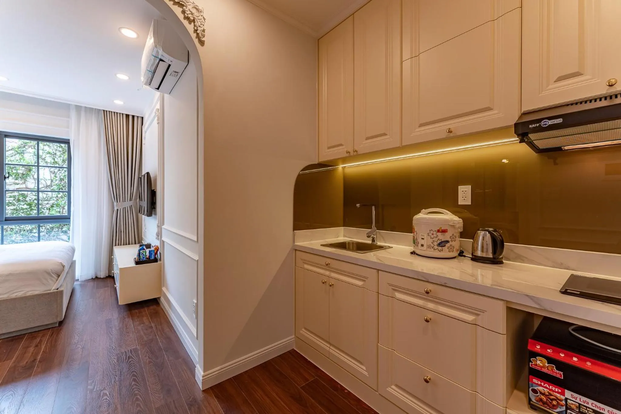 Bed in Golden Sun Apartment & Hotel