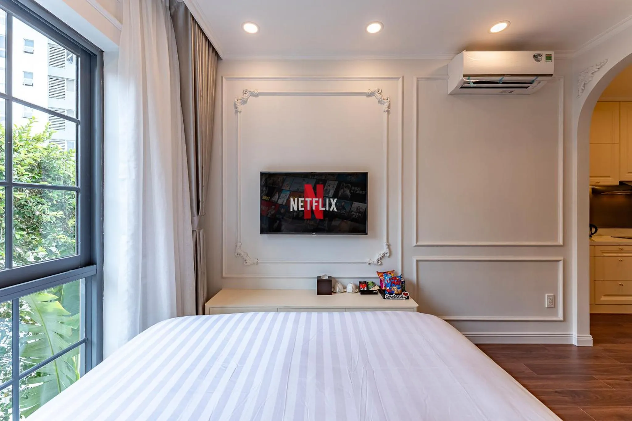 Bed in Golden Sun Apartment & Hotel