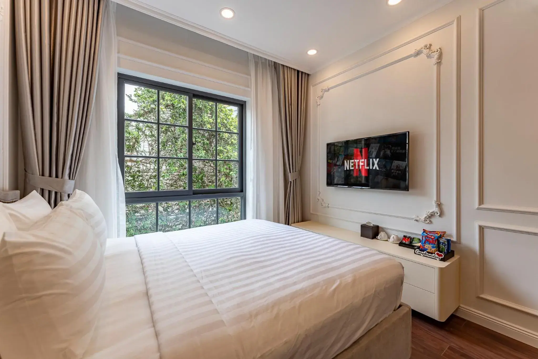 Bed in Golden Sun Apartment & Hotel Bed in Golden Sun Apartment & Hotel