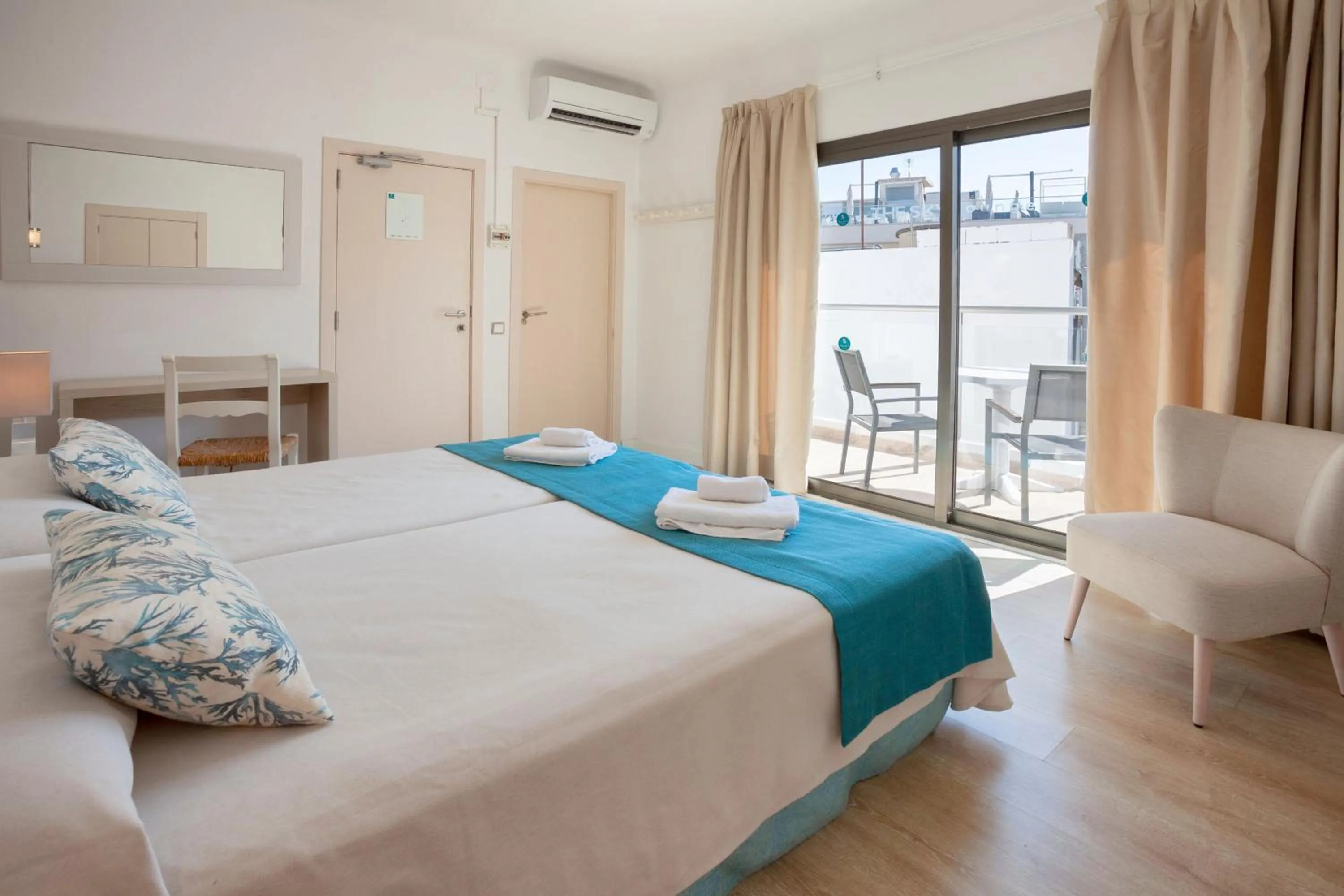 Photo of the whole room, Bed in Petit Garden Hotel by Flacalco