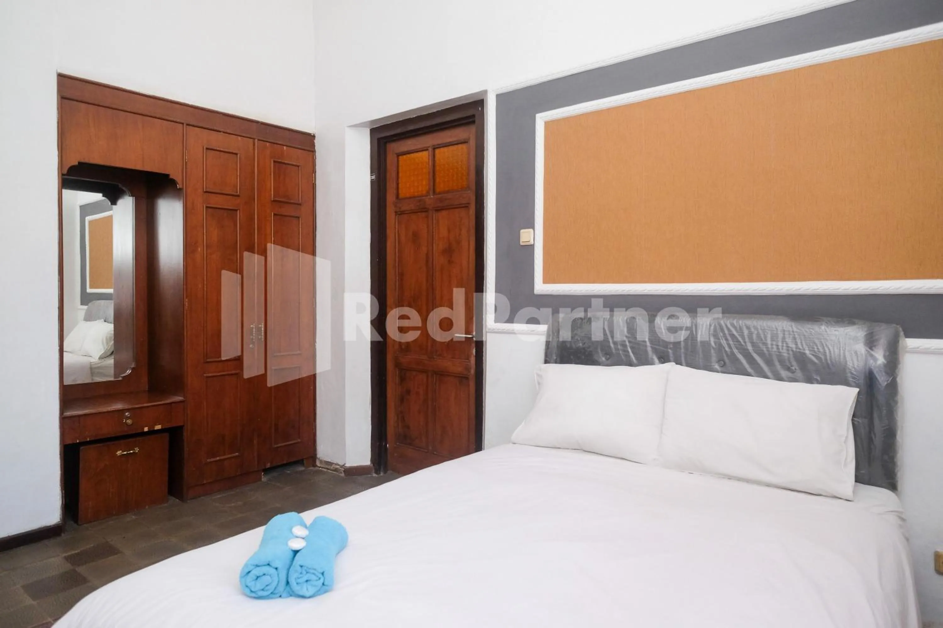 Bed in Hotel Limaran 1 Syariah Malioboro Mitra RedDoorz