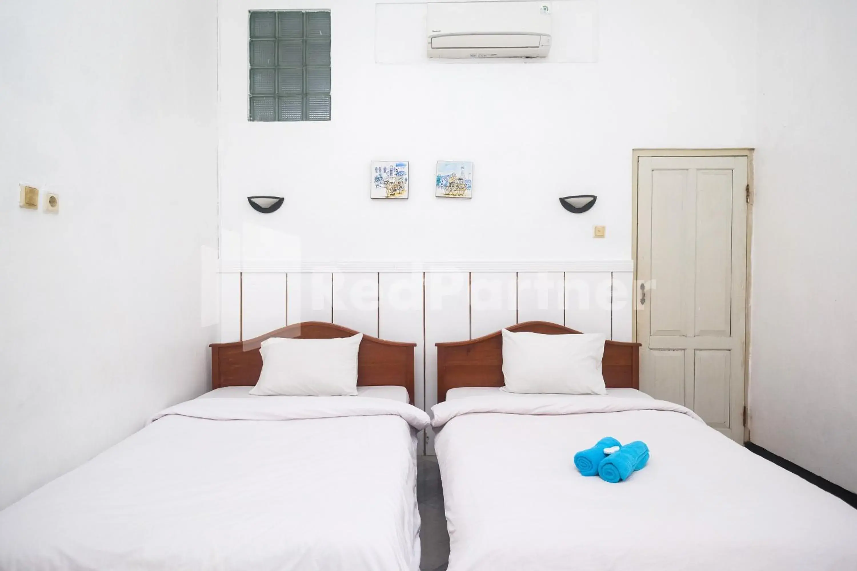 Deluxe Twin Room - single occupancy in Hotel Limaran 1 Syariah Malioboro Mitra RedDoorz Deluxe Twin Room - single occupancy in Hotel Limaran 1 Syariah Malioboro Mitra RedDoorz