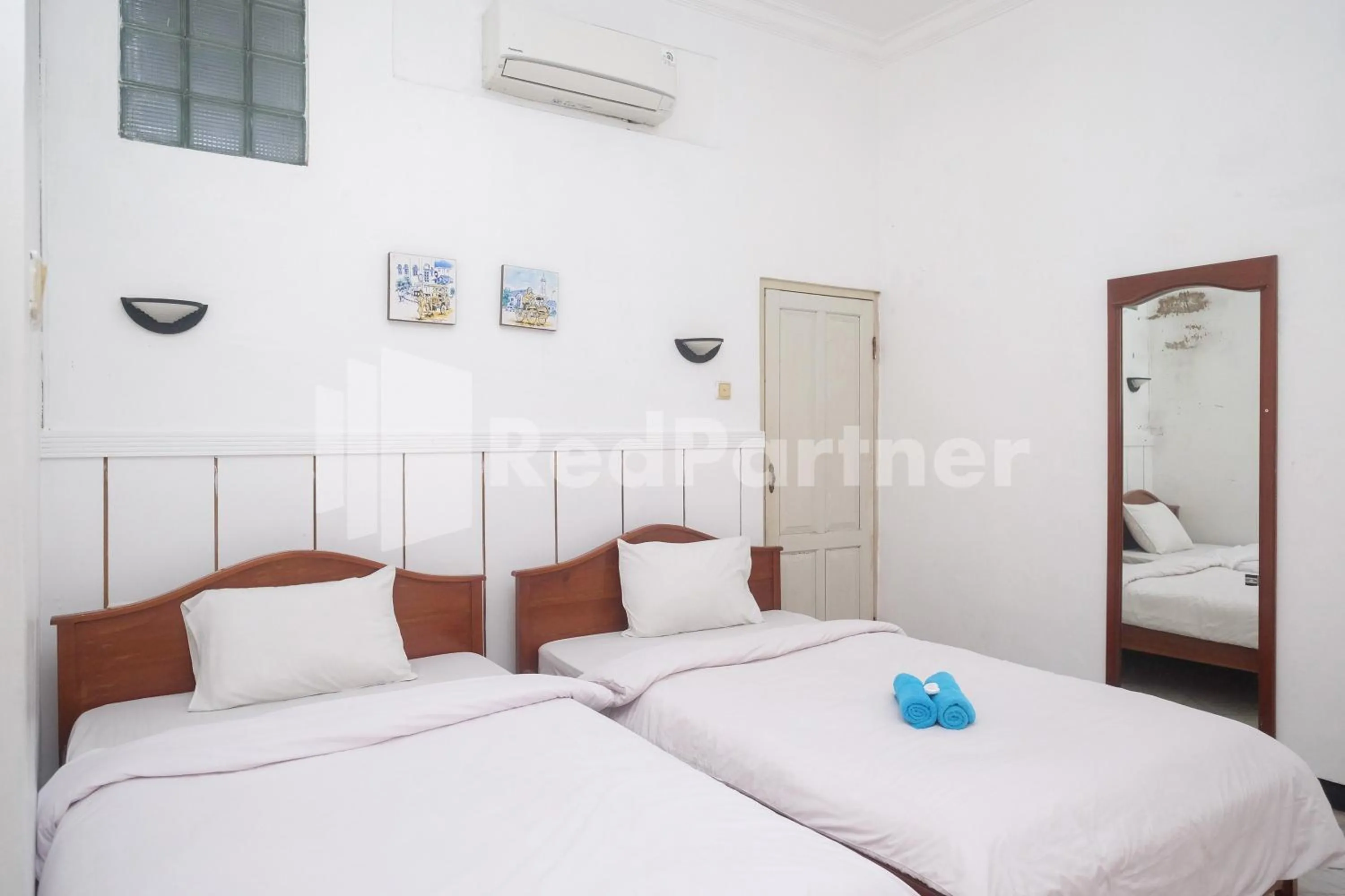 Bed in Hotel Limaran 1 Syariah Malioboro Mitra RedDoorz