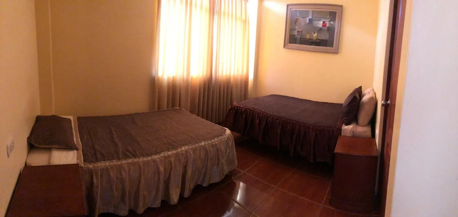 Photo of the whole room, Bed in Hostal Huacachina Sunset