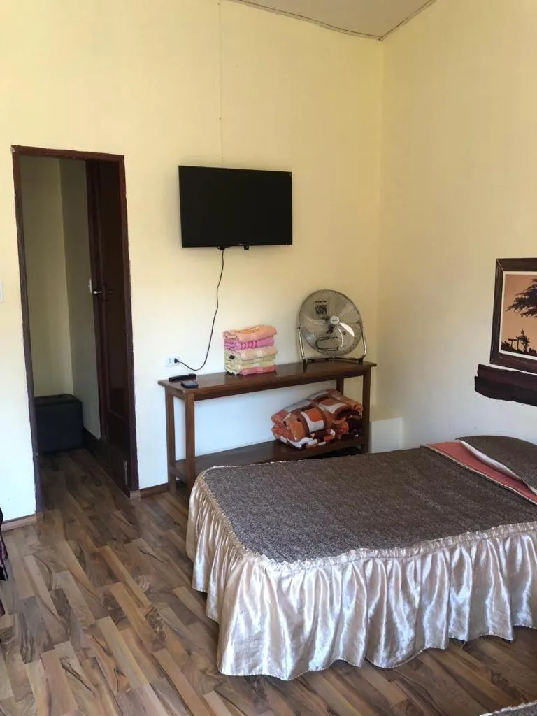 Bed in Hostal Huacachina Sunset