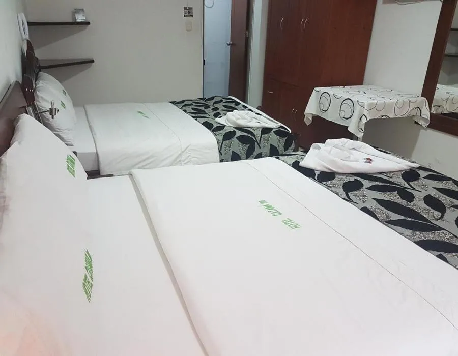 Bed in Hotel Catama Inn
