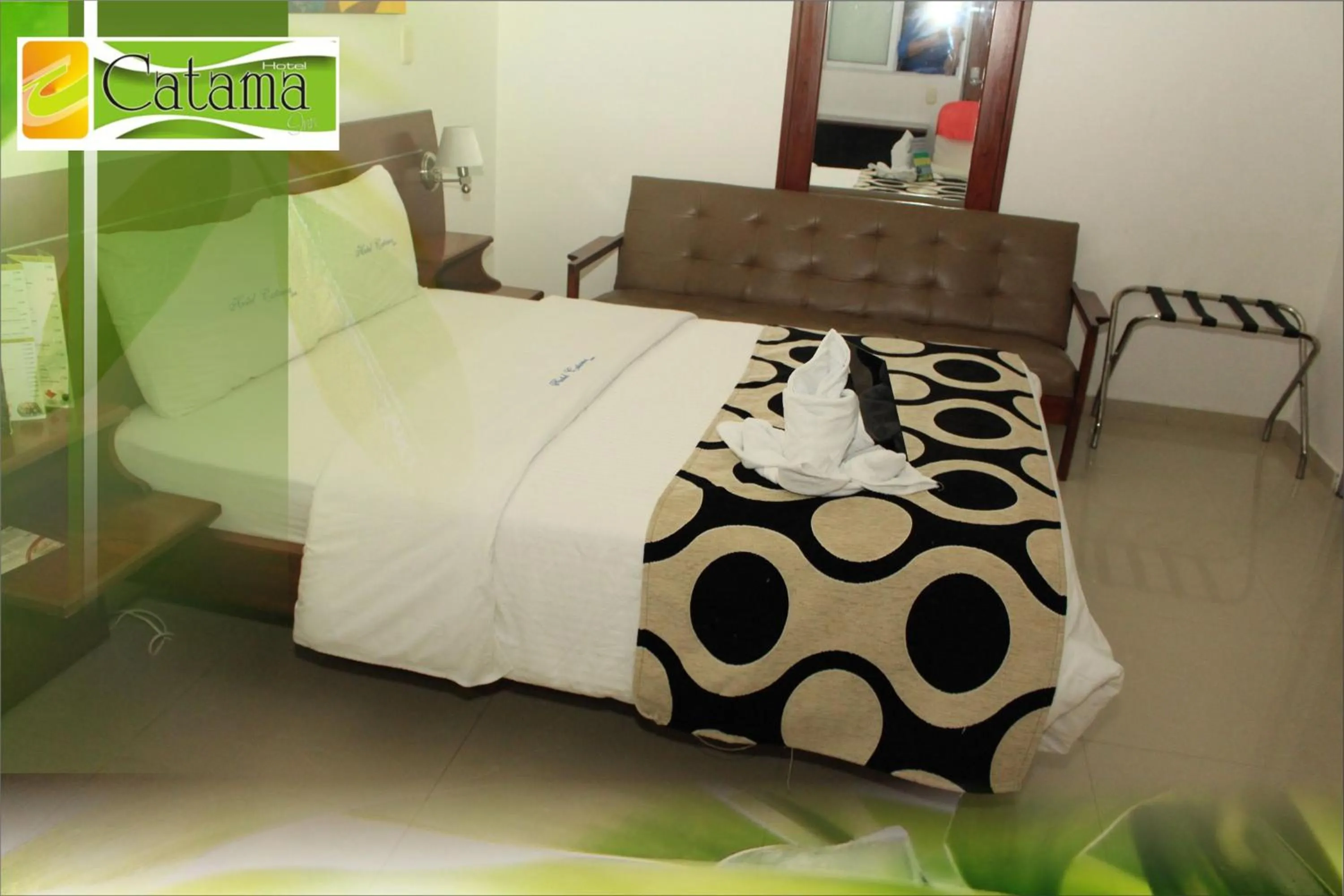Bed in Hotel Catama Inn