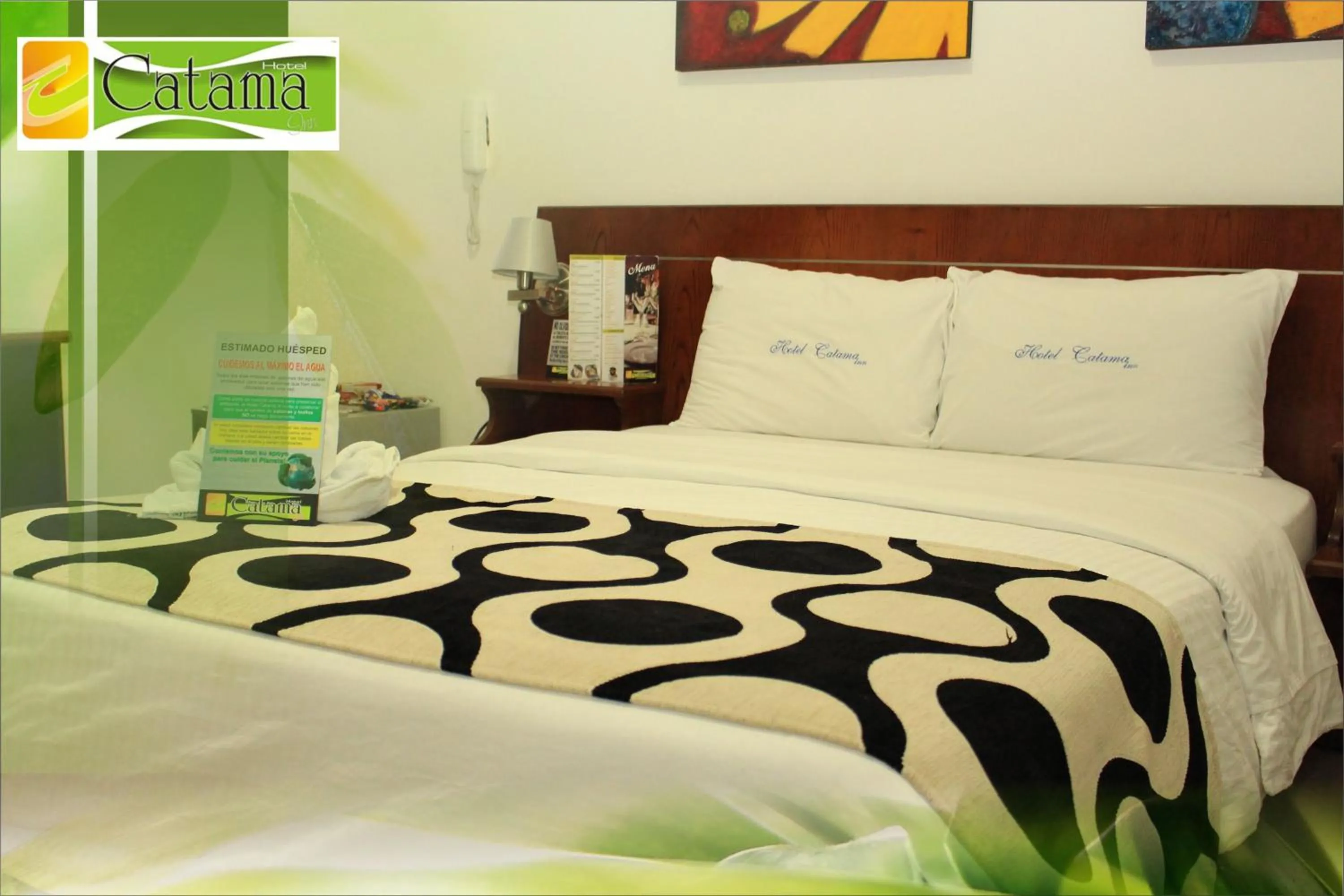 Bed in Hotel Catama Inn
