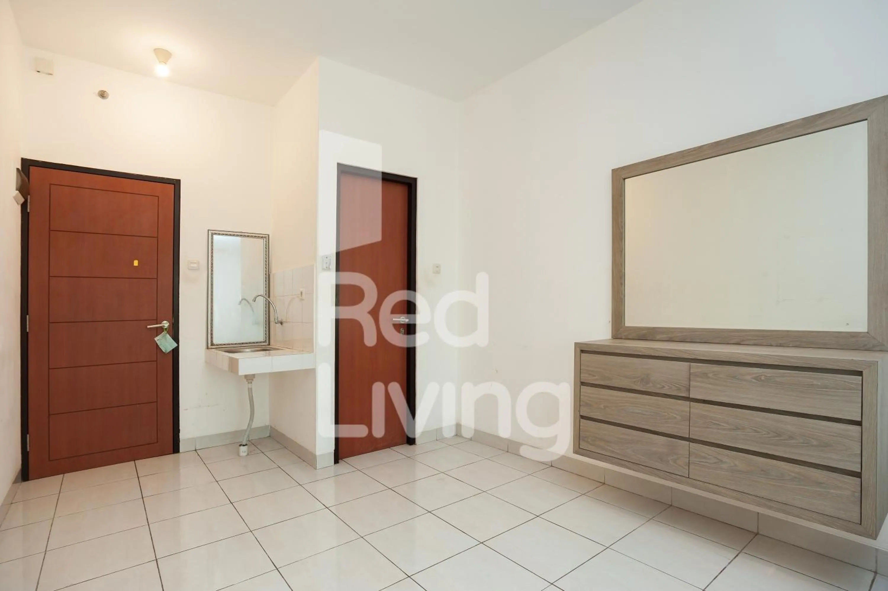 Bedroom in RedLiving Apartemen RQ at Ecohome Citra Raya