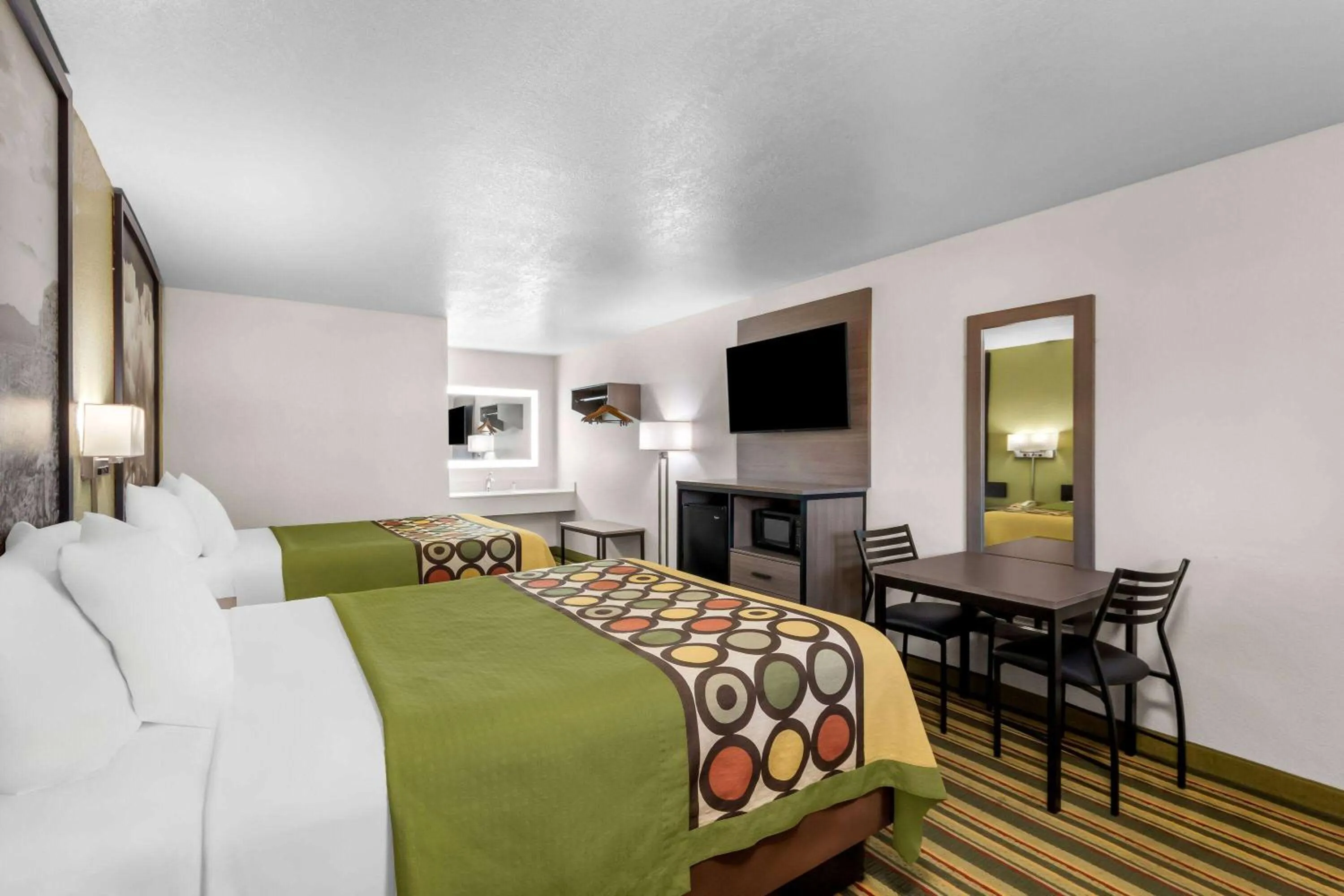 Bed in Super 8 by Wyndham Pleasanton