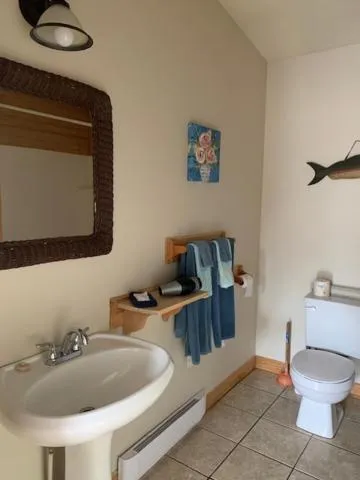 Bathroom in Whispering Waves Cottages