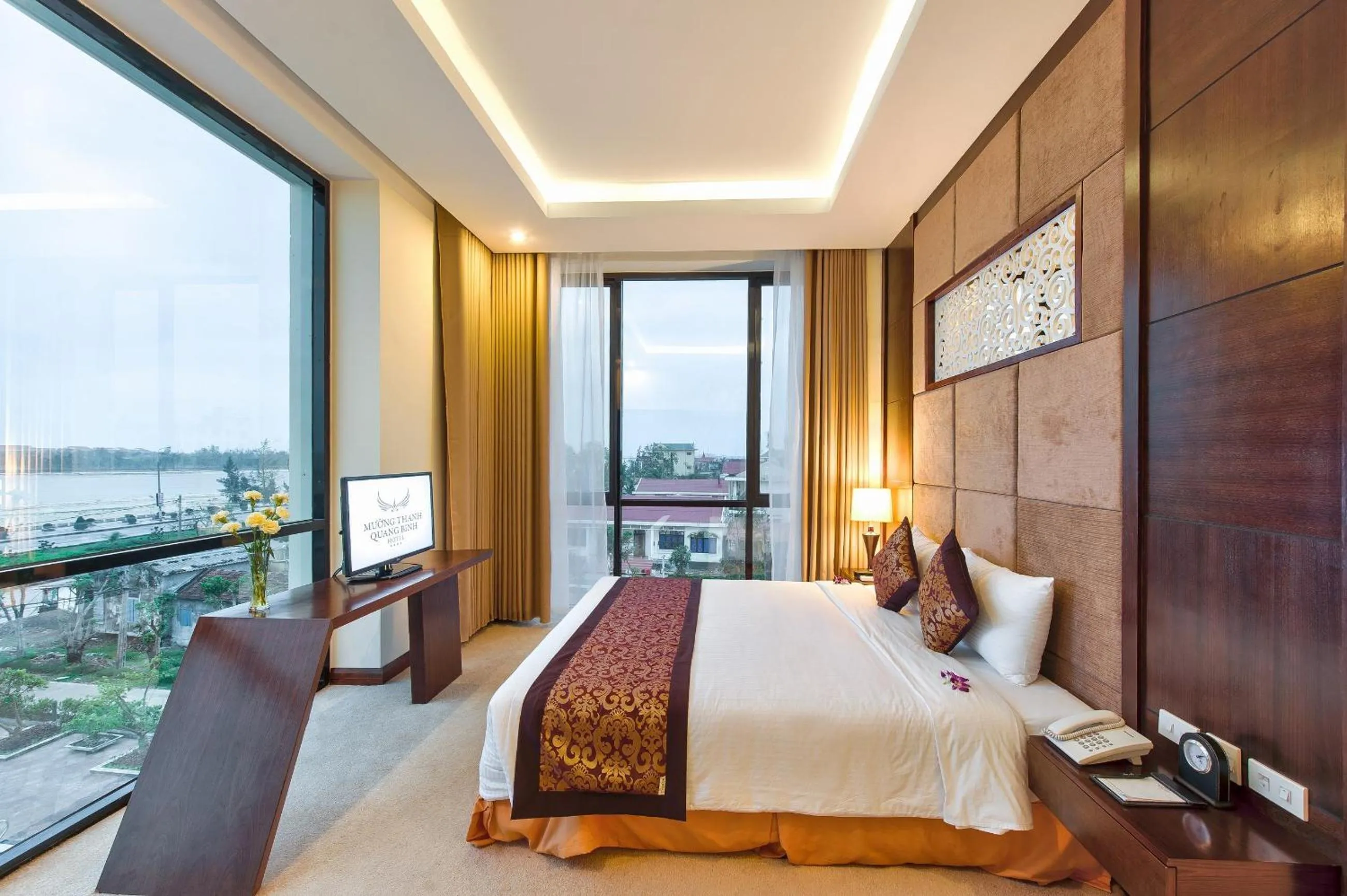 Bed in Muong Thanh Holiday Quang Binh Hotel
