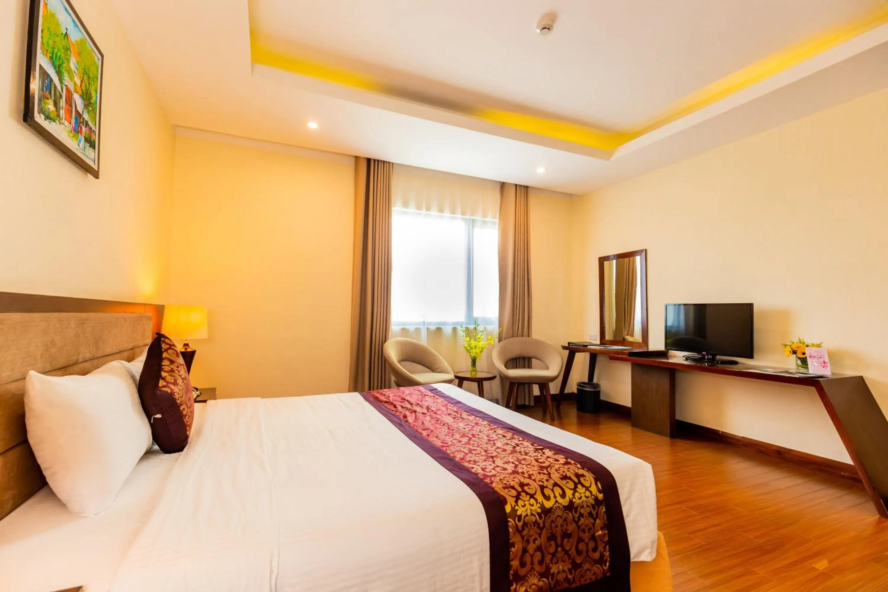 TV and multimedia, Bed in Muong Thanh Holiday Quang Binh Hotel