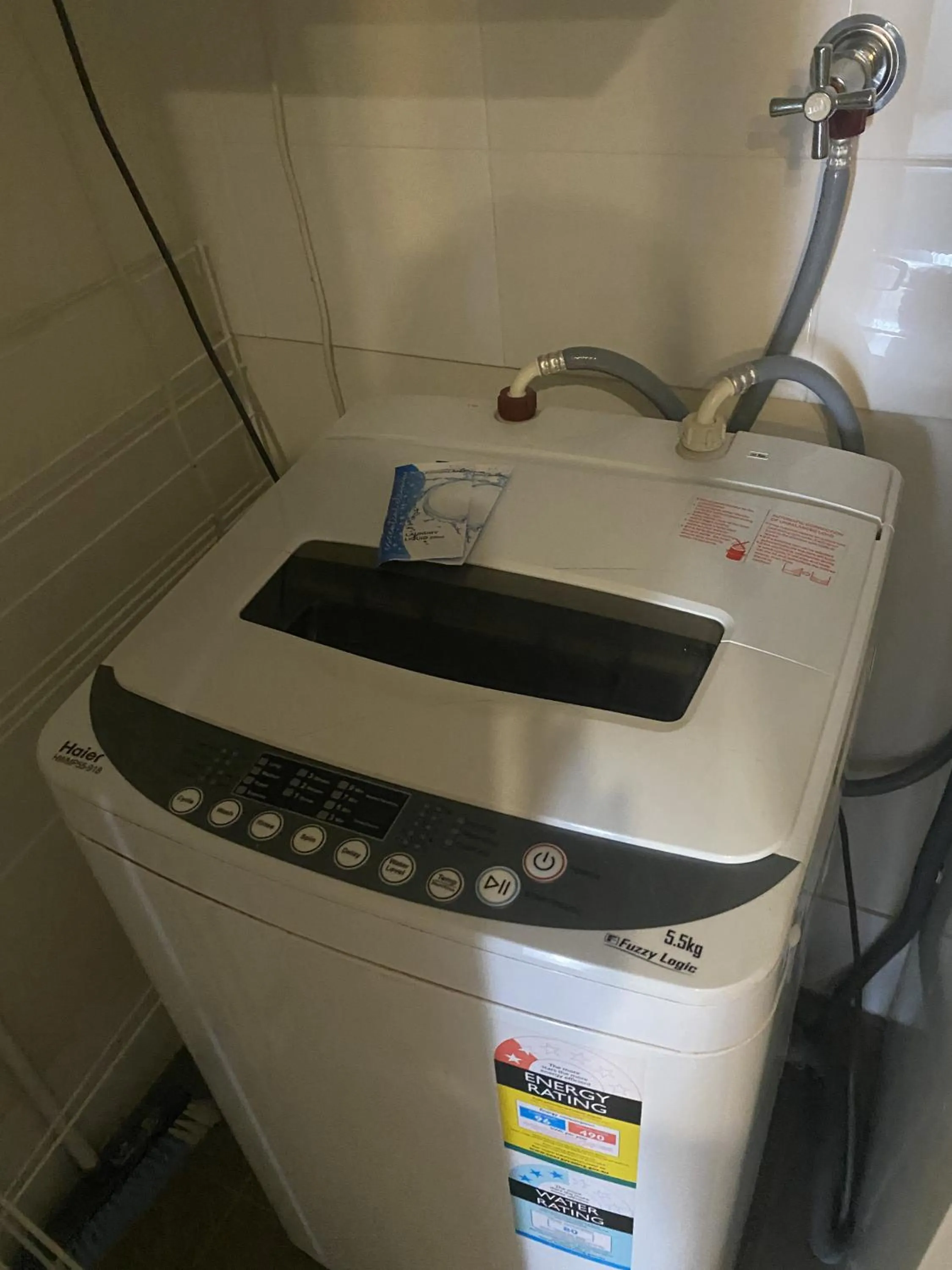 washing machine in Curtis Central Apartments Official