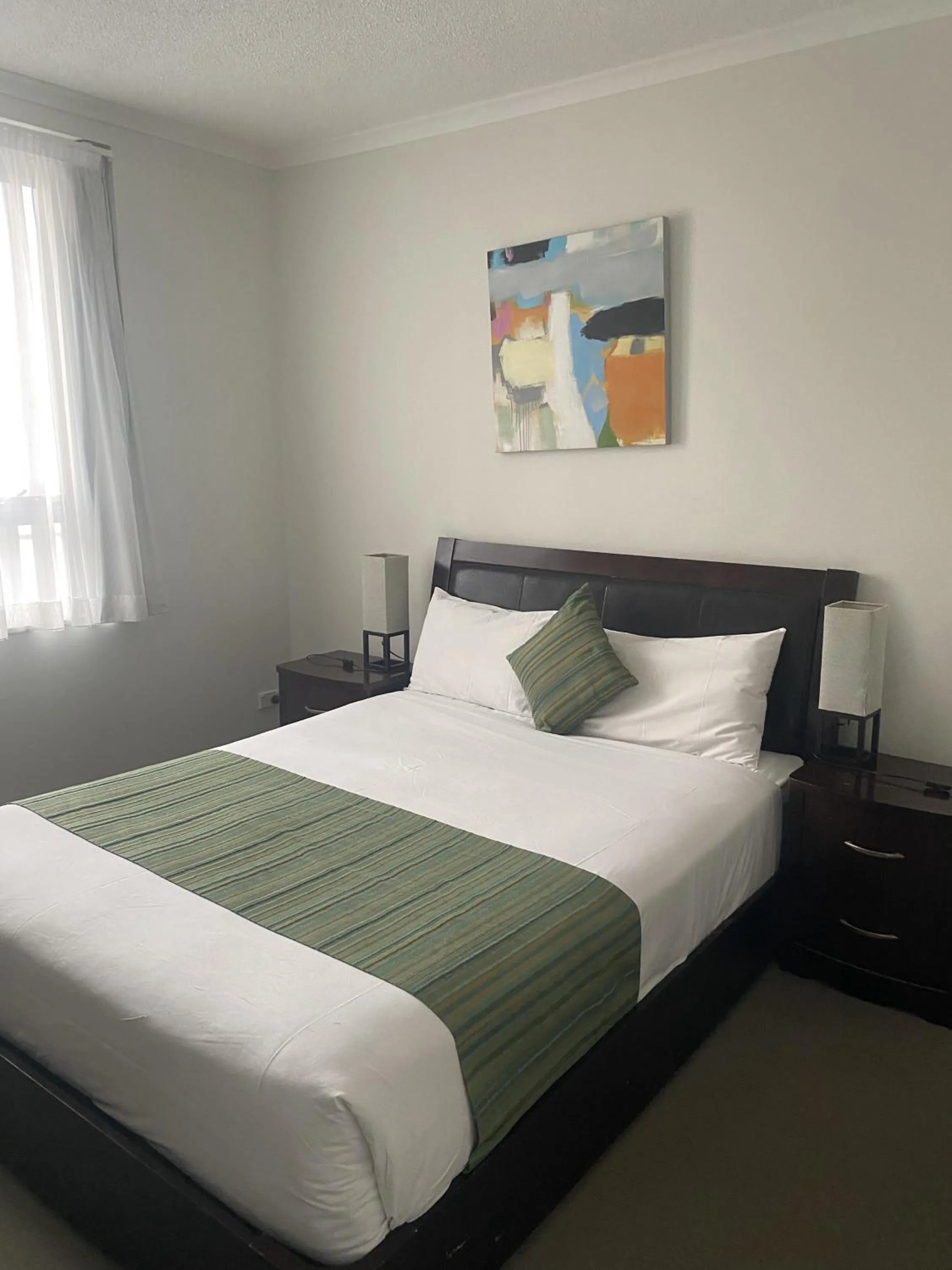 Photo of the whole room, Bed in Curtis Central Apartments Official