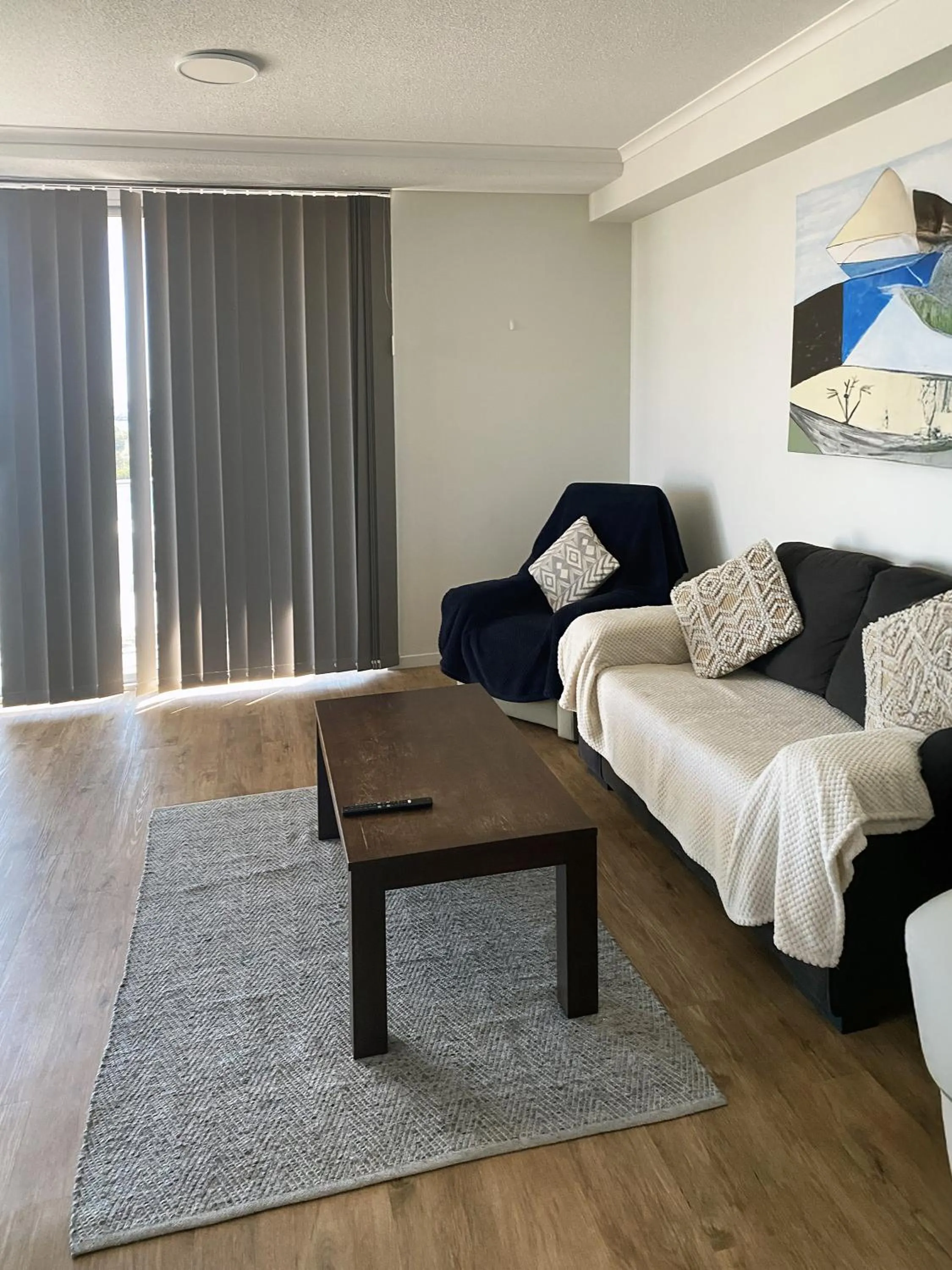 Living room in Curtis Central Apartments Official