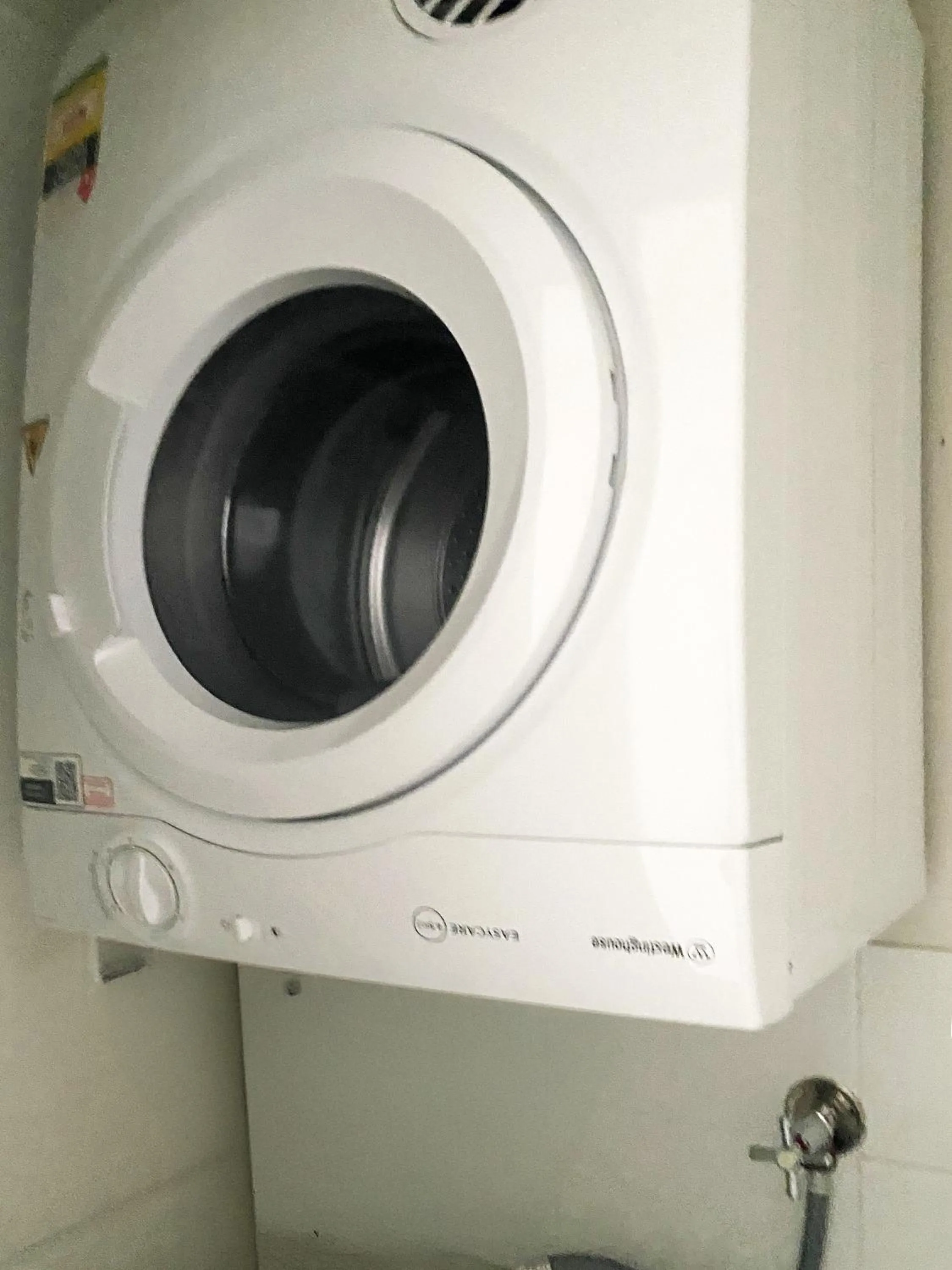 washing machine in Curtis Central Apartments Official