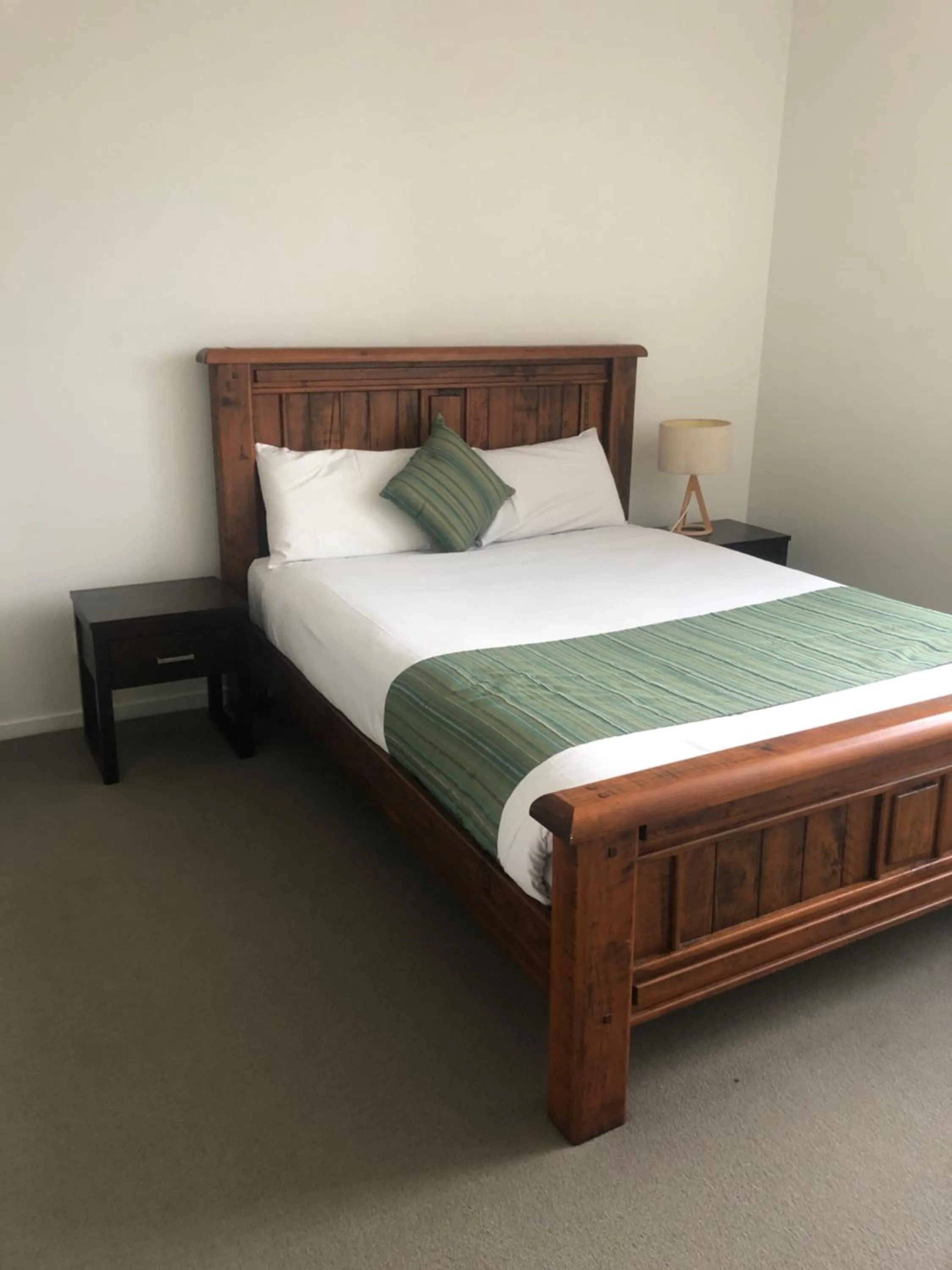 Bedroom, Bed in Curtis Central Apartments Official