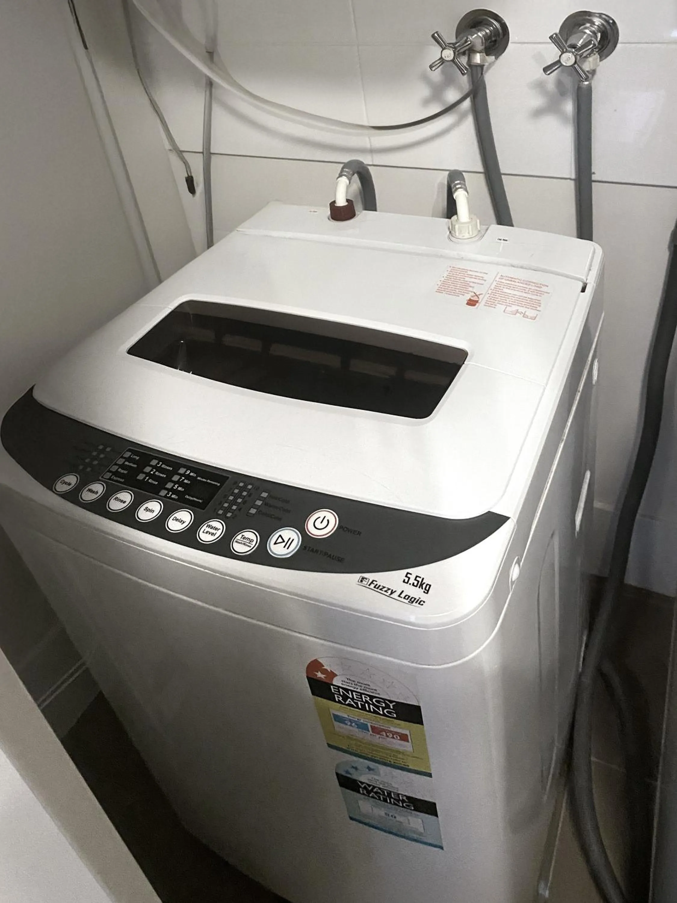 washing machine in Curtis Central Apartments Official