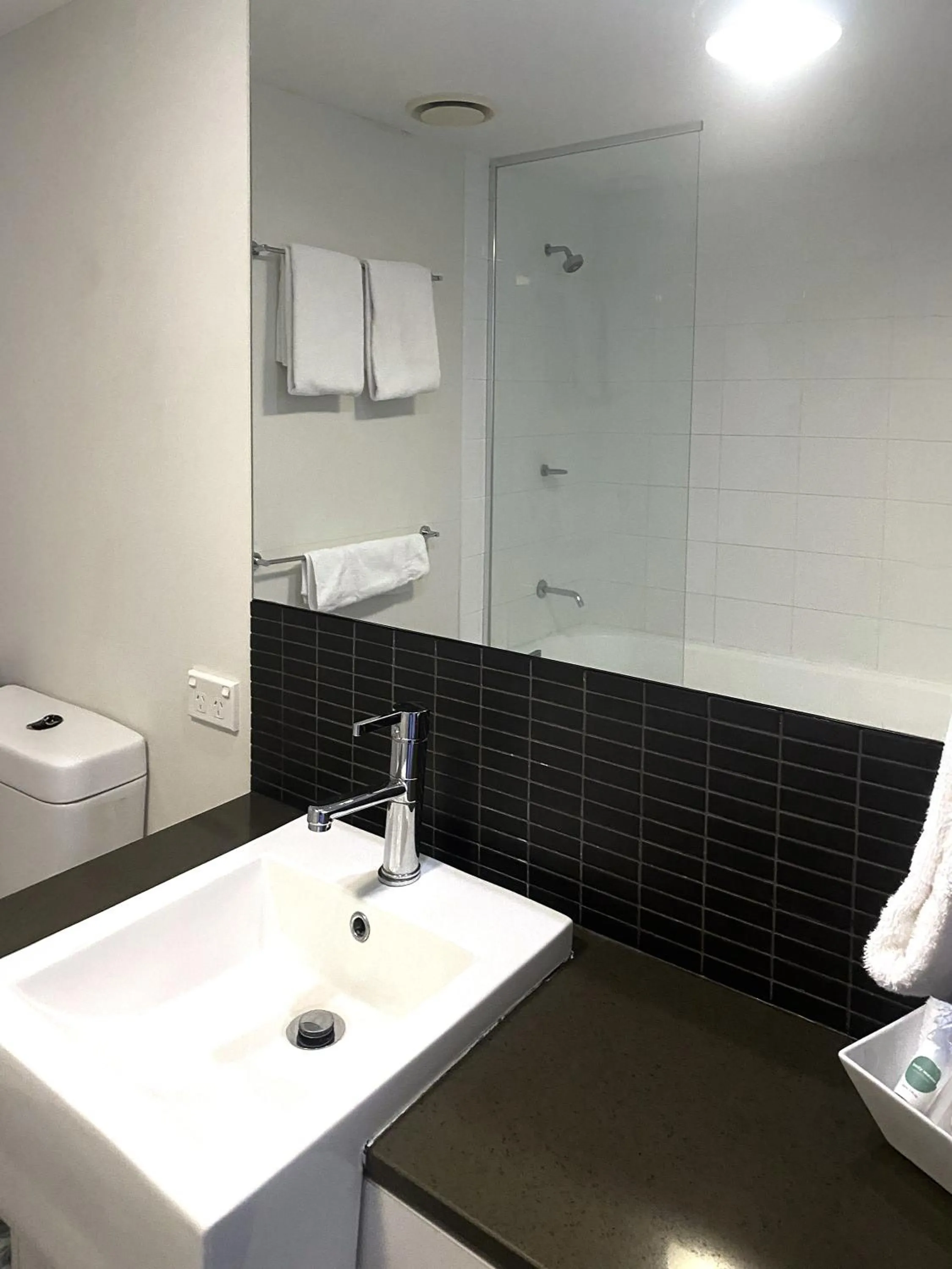 Toilet in Curtis Central Apartments Official