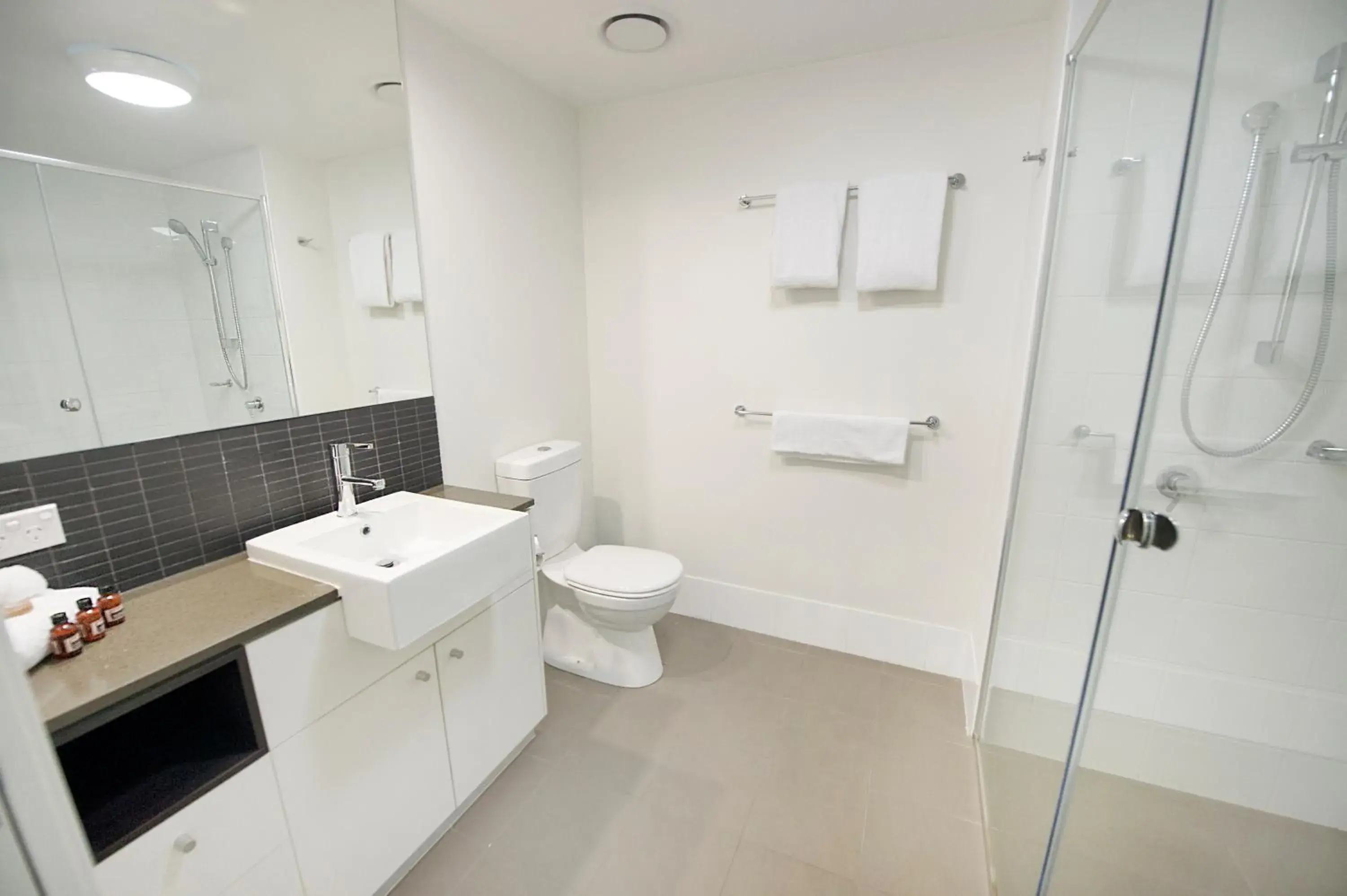 Bathroom in Curtis Central Apartments Official Bathroom in Curtis Central Apartments Official