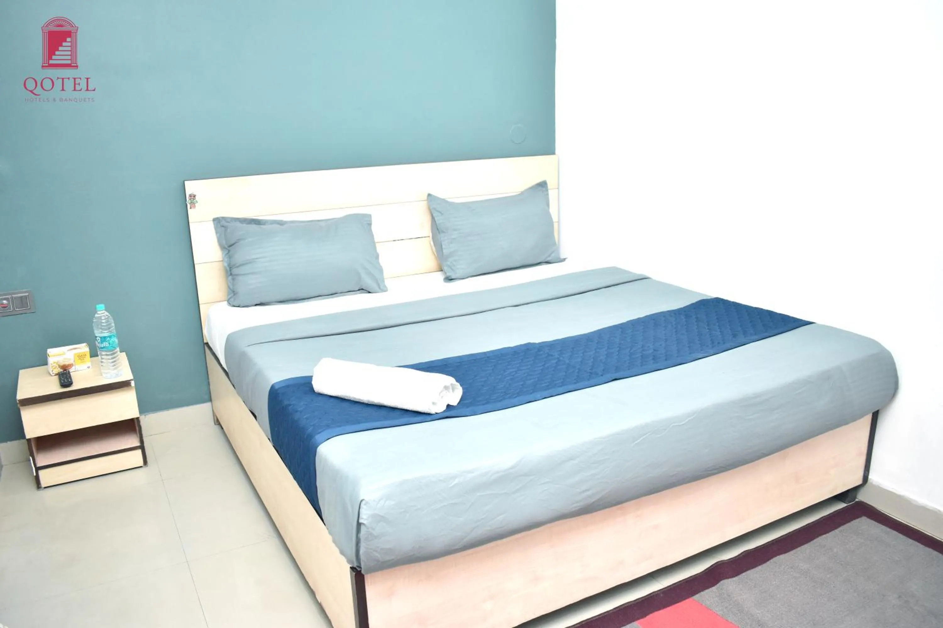 Bed in Qotel Hotel Rama Rohini Sector-24 Couple Friendly