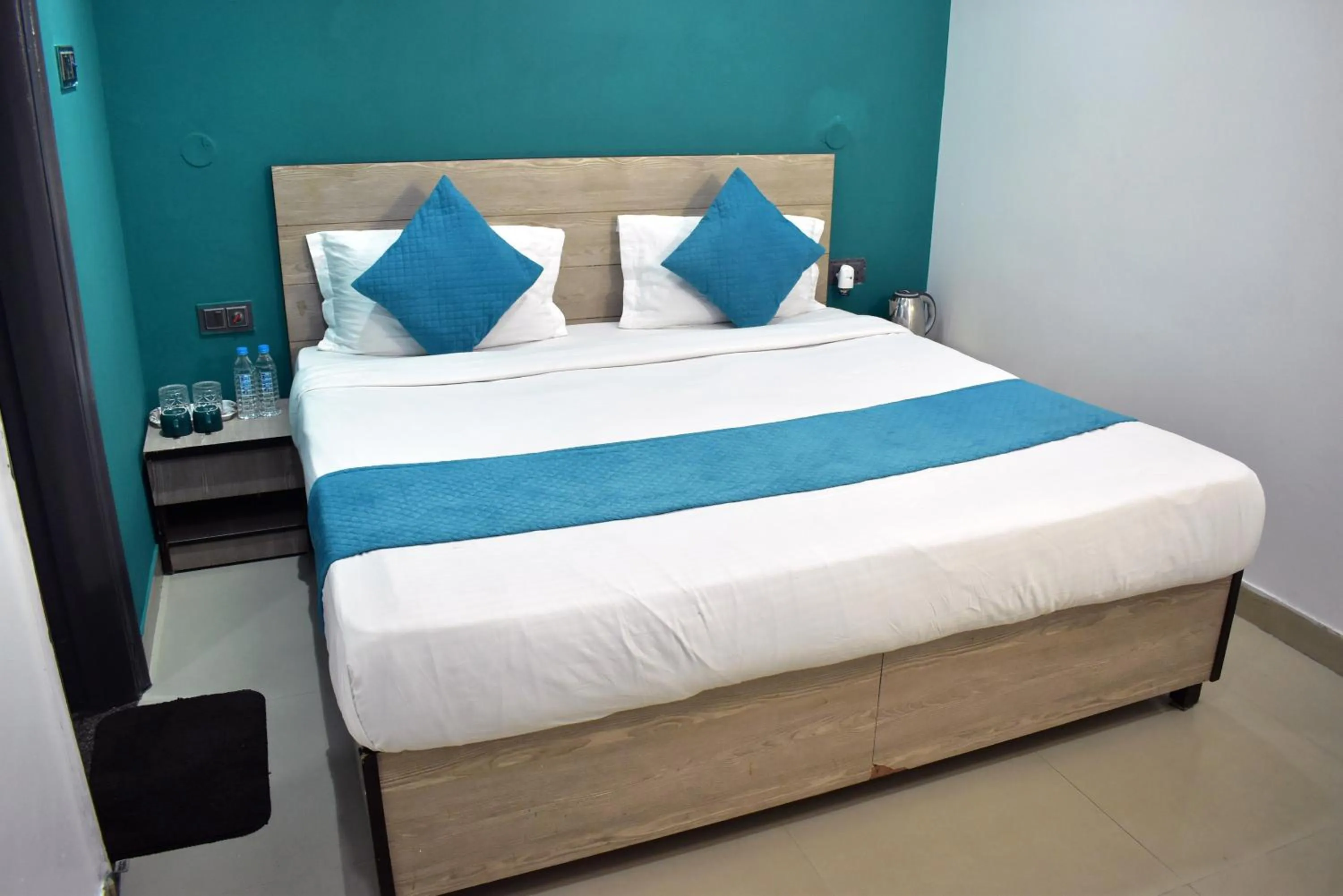 Bed in Qotel Hotel Rama Rohini Sector-24 Couple Friendly